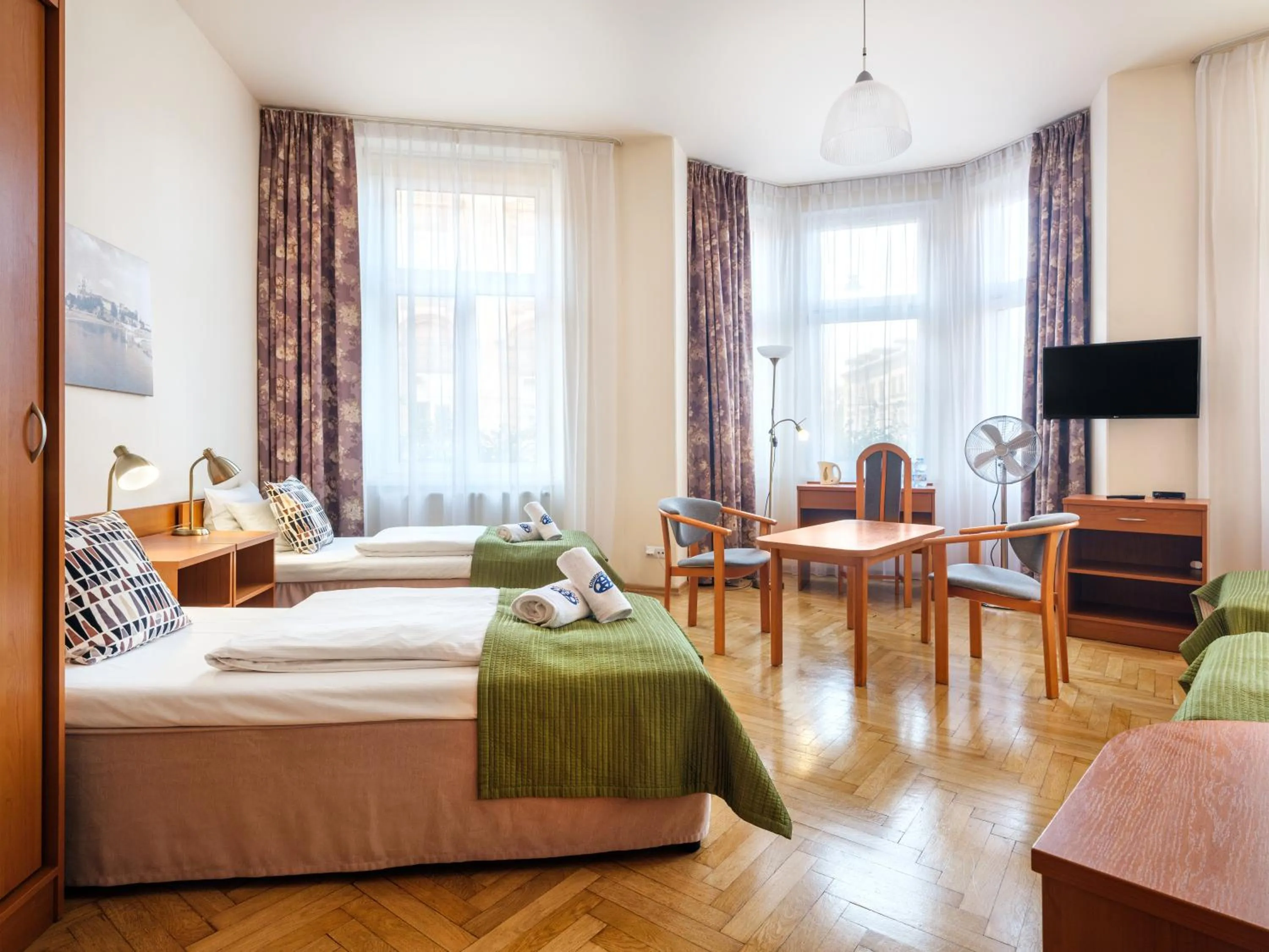 Bed in Kosmopolita Rooms