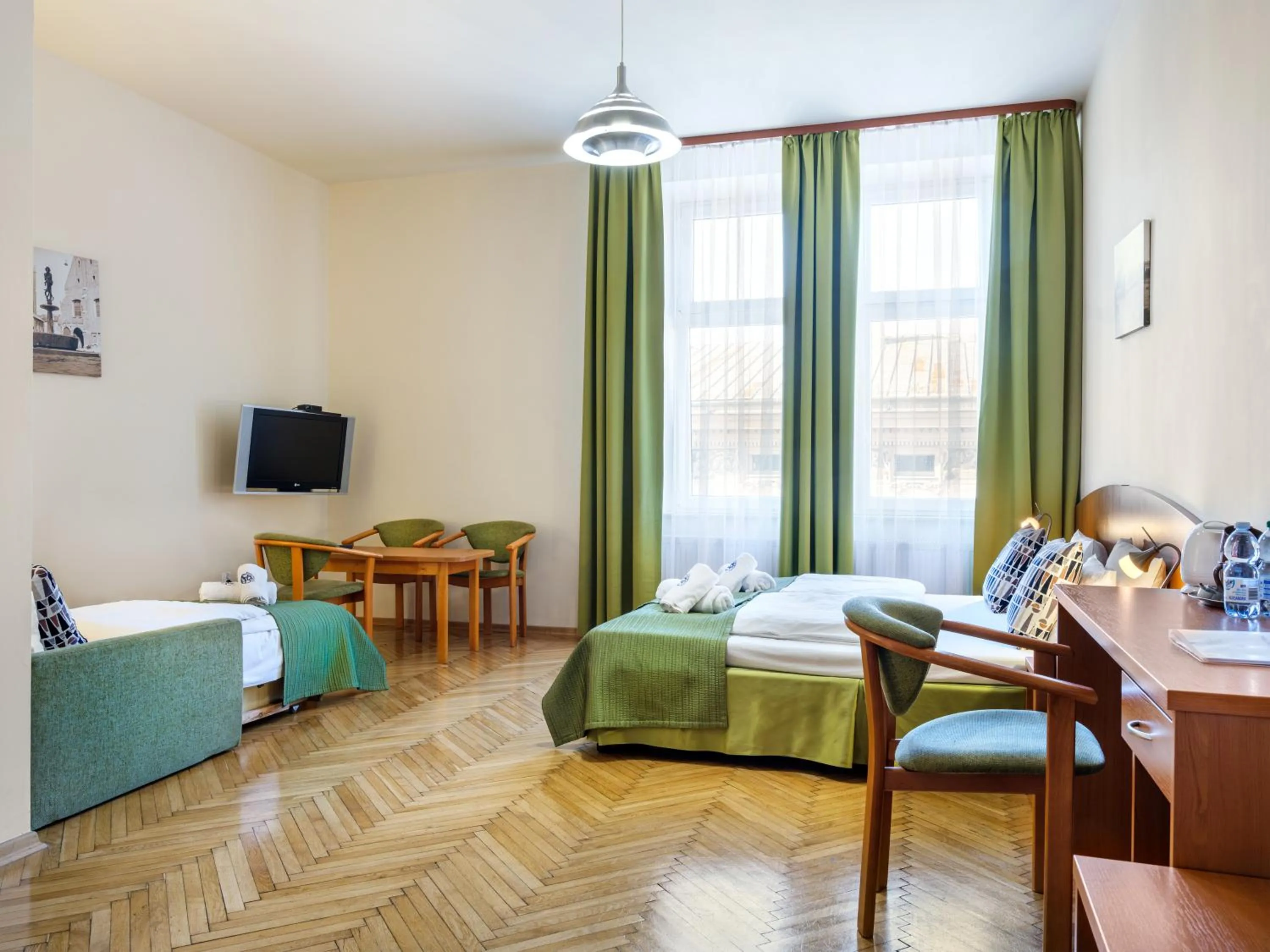 Bed in Kosmopolita Rooms