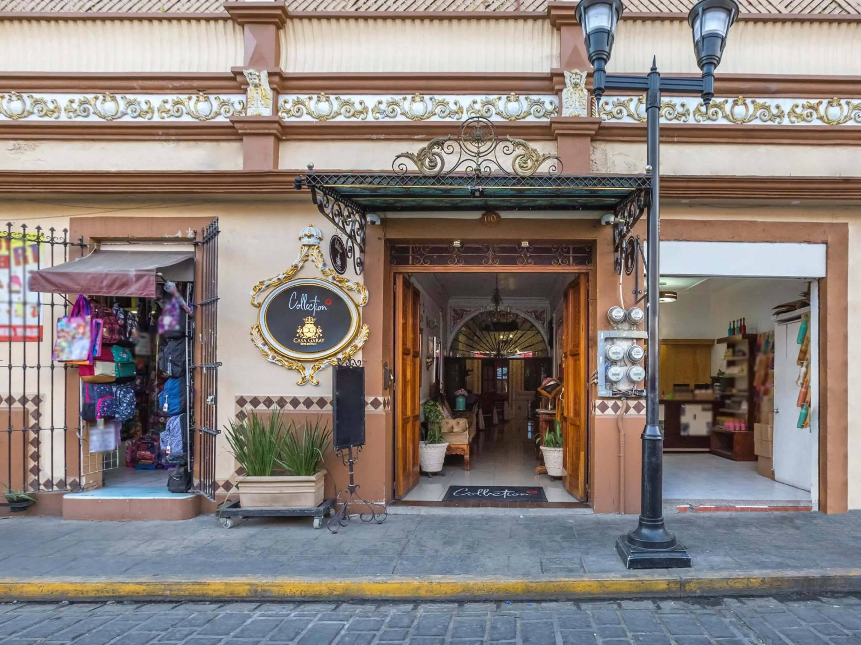 Facade/entrance in Capital O Hotel Patio Pombo