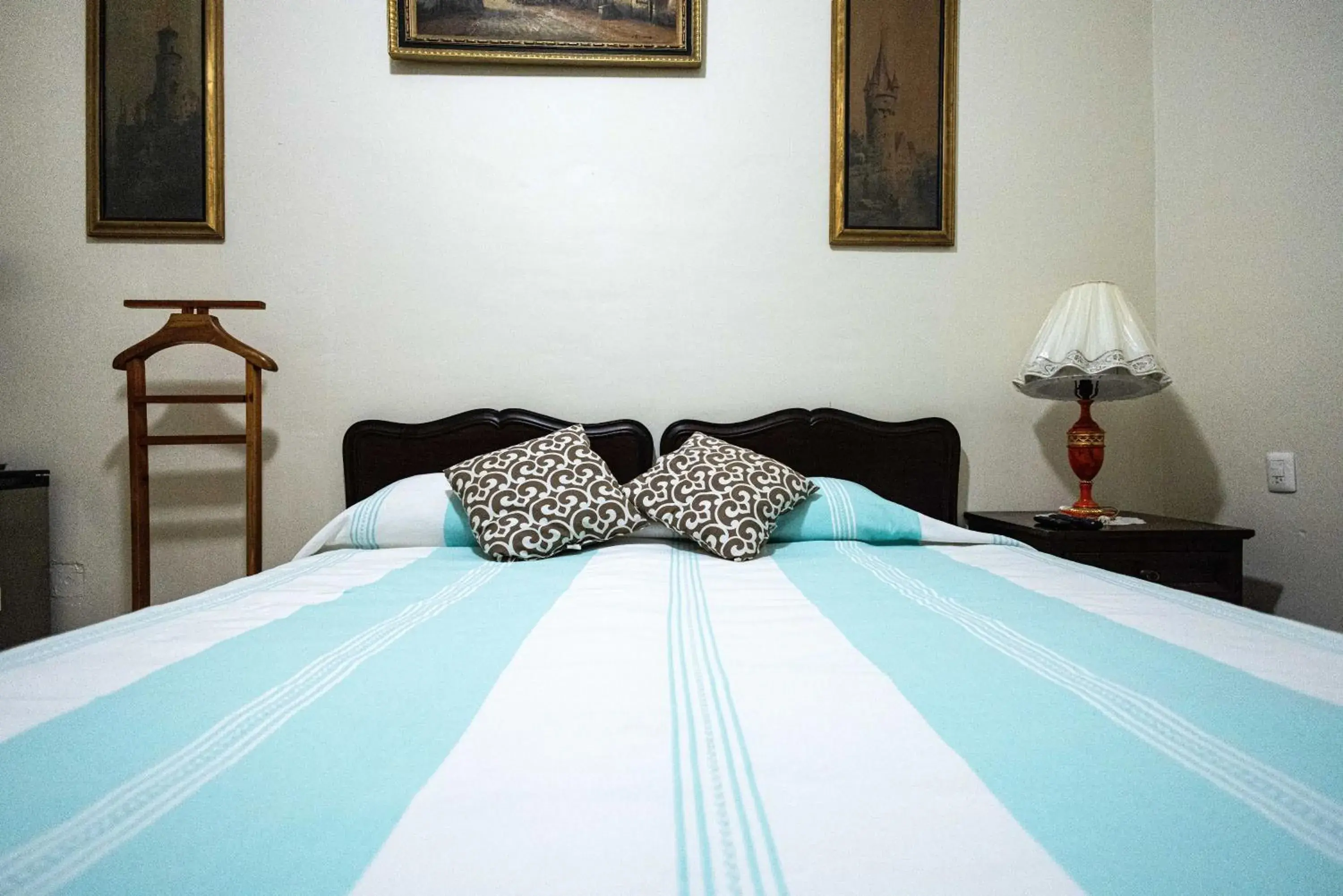 Bedroom, Bed in Capital O Hotel Patio Pombo Bedroom, Bed in Capital O Hotel Patio Pombo