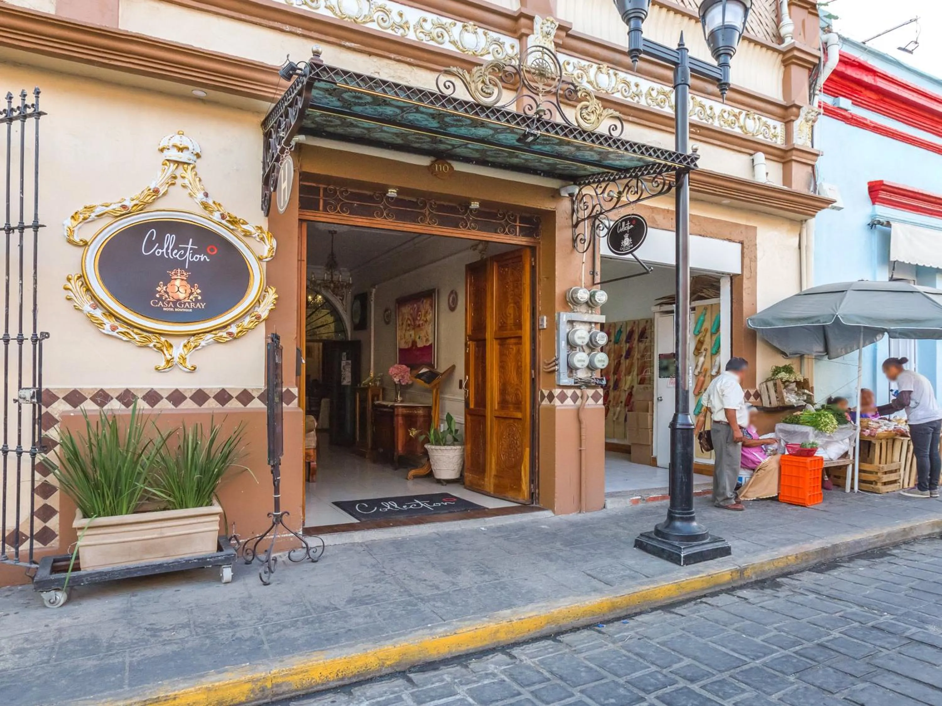 Facade/entrance in Capital O Hotel Patio Pombo