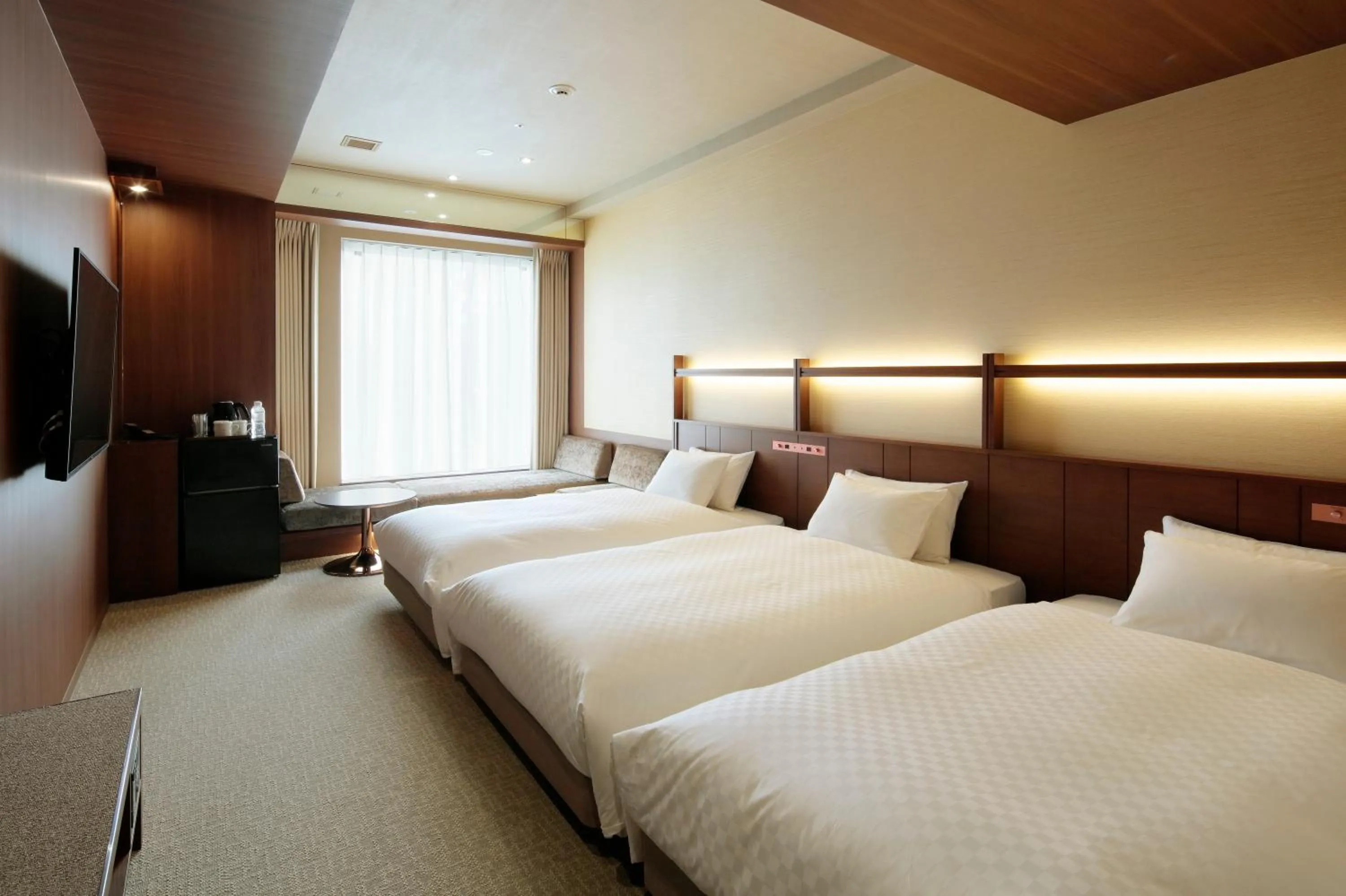 Photo of the whole room, Bed in Candeo Hotels Kumamoto Shinshigai