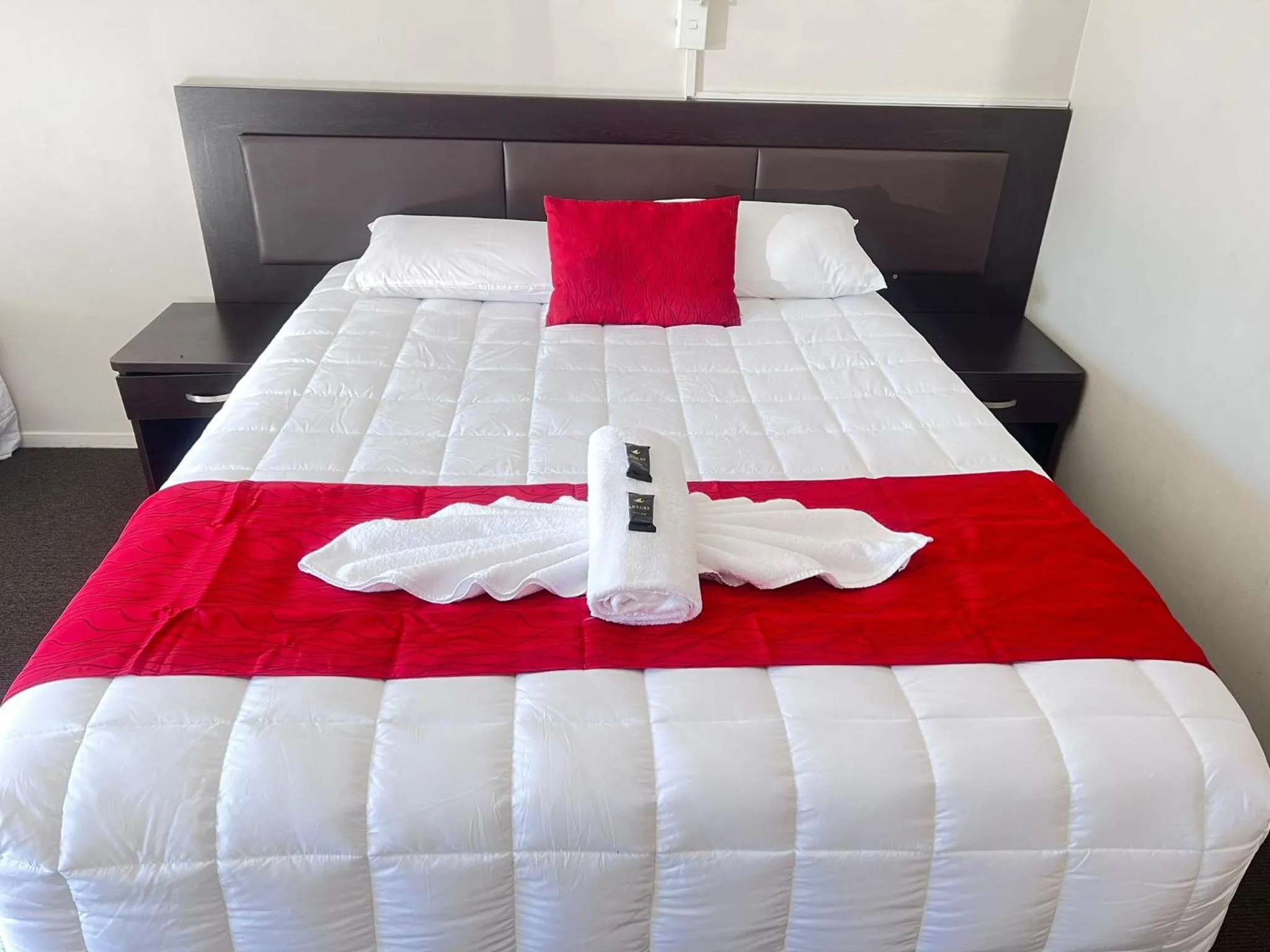 Bed in Monument Motor Lodge Papakura