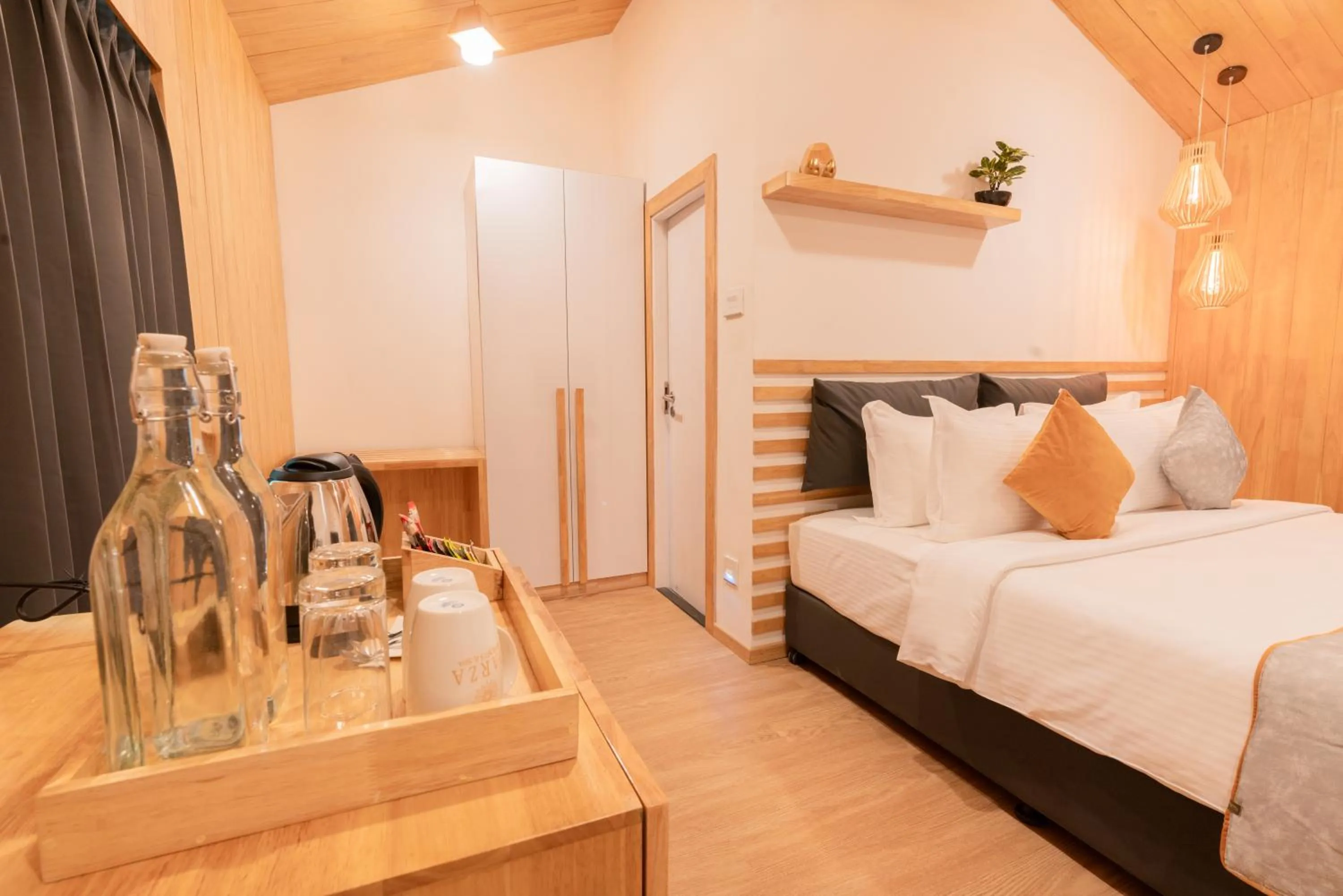 Bed in DARZA LUXURY RESORTs