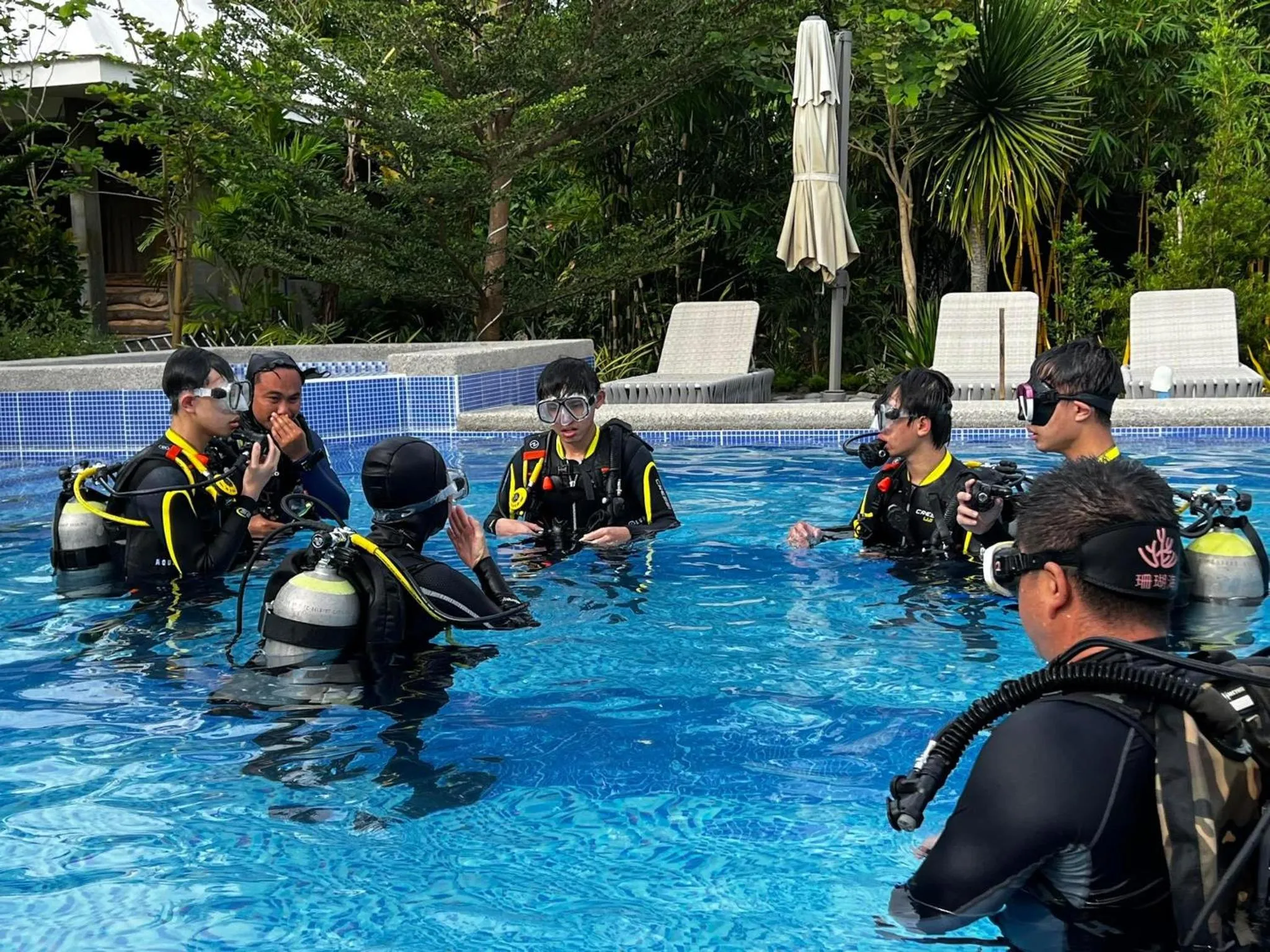 People in Infinity Diving Resort and Residences