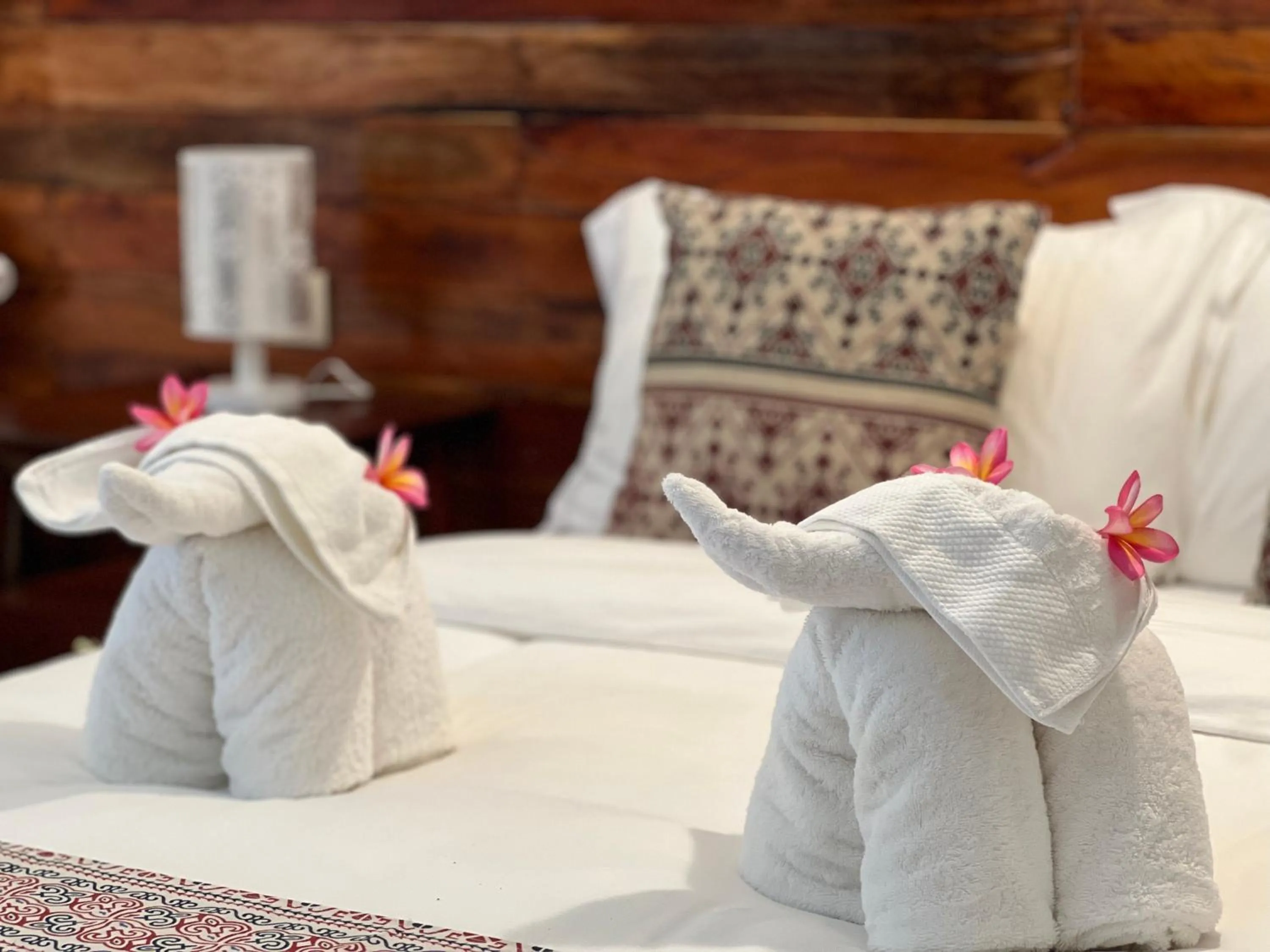 towels, Bed in Infinity Diving Resort and Residences