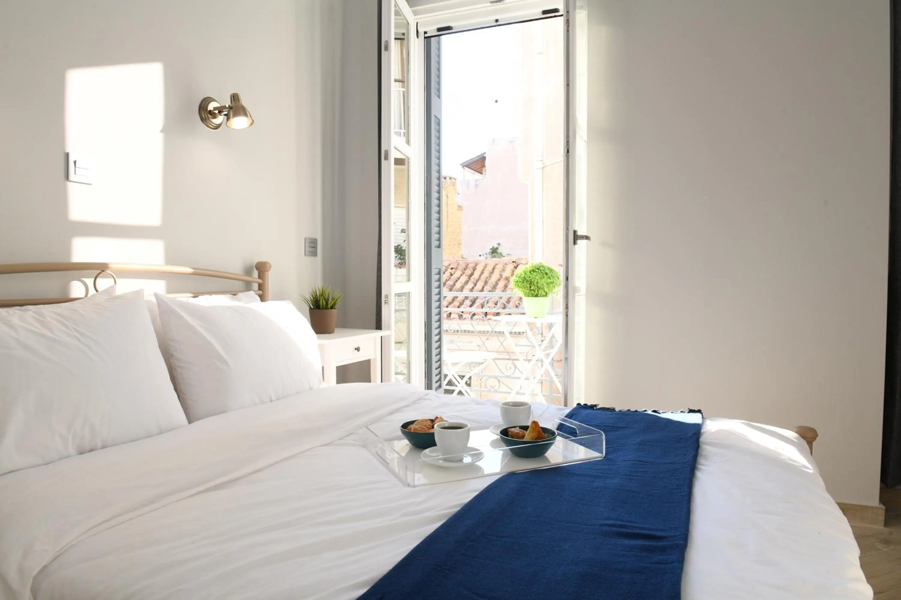 Bed in Neapolis 1897 Boutique Luxury Rooms