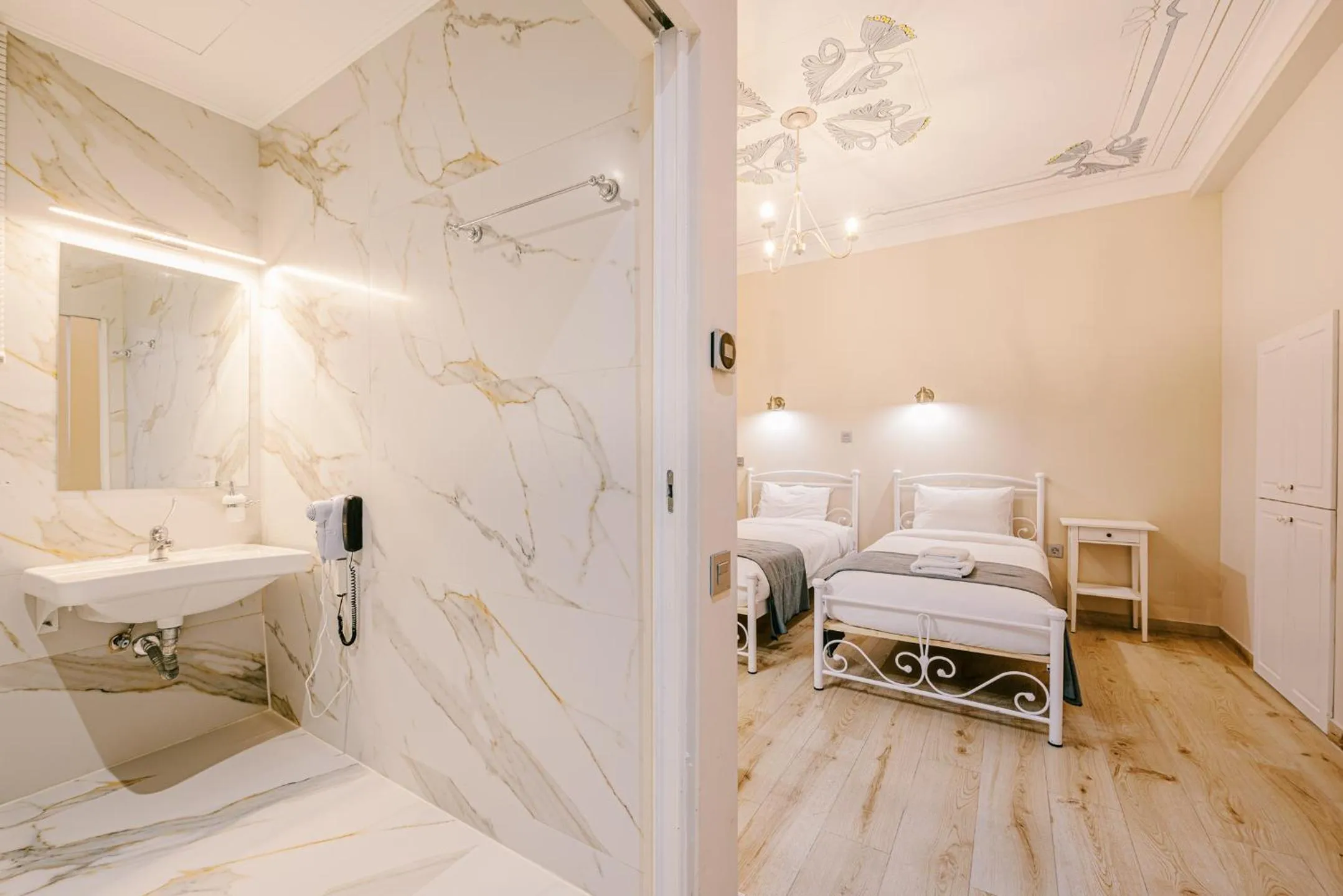 Phryne - Twin Room AMEA Disability Access Ground Floor in Neapolis 1897 Boutique Luxury Rooms