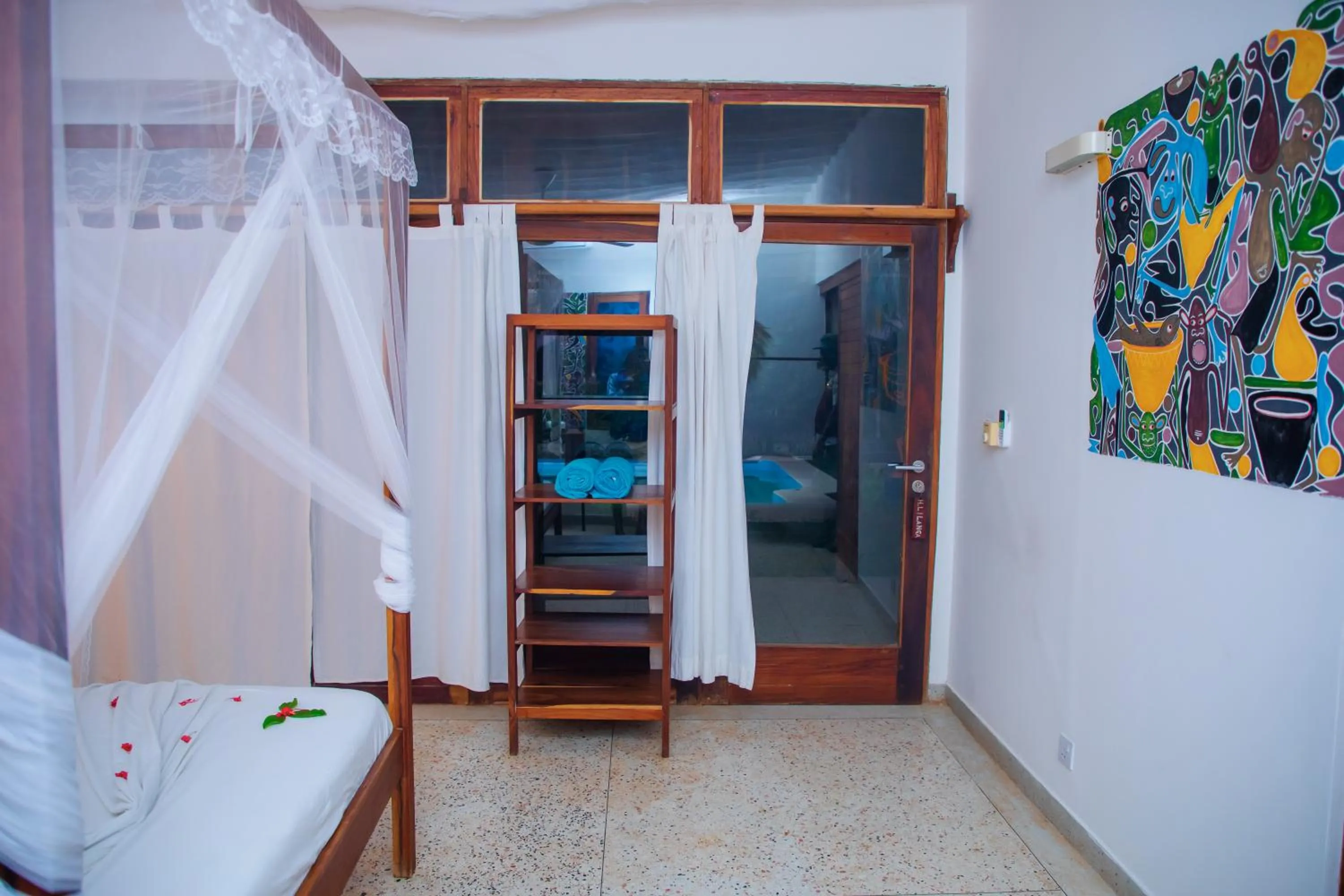 Bed in Art Hotel Zanzibar