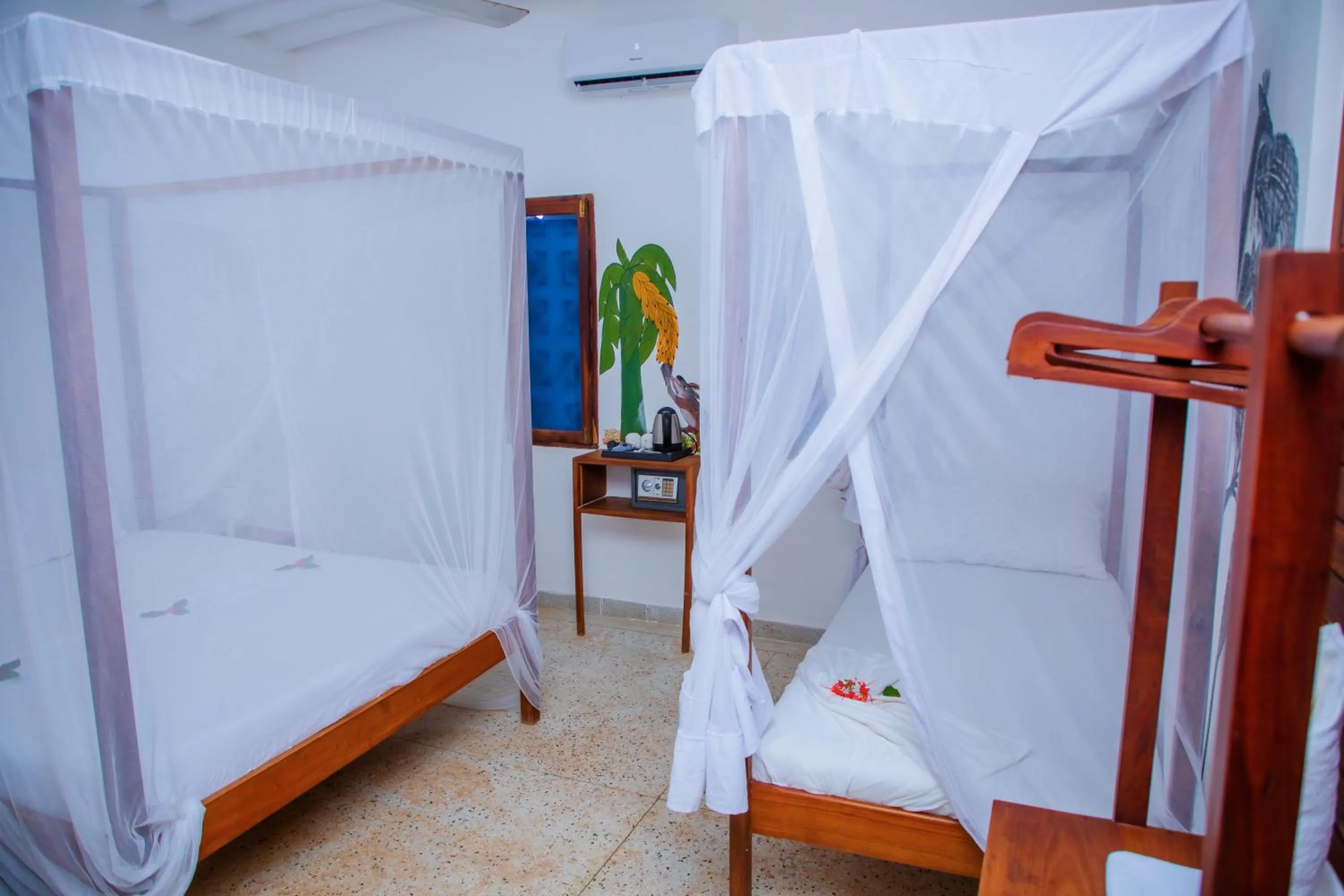 Bed in Art Hotel Zanzibar