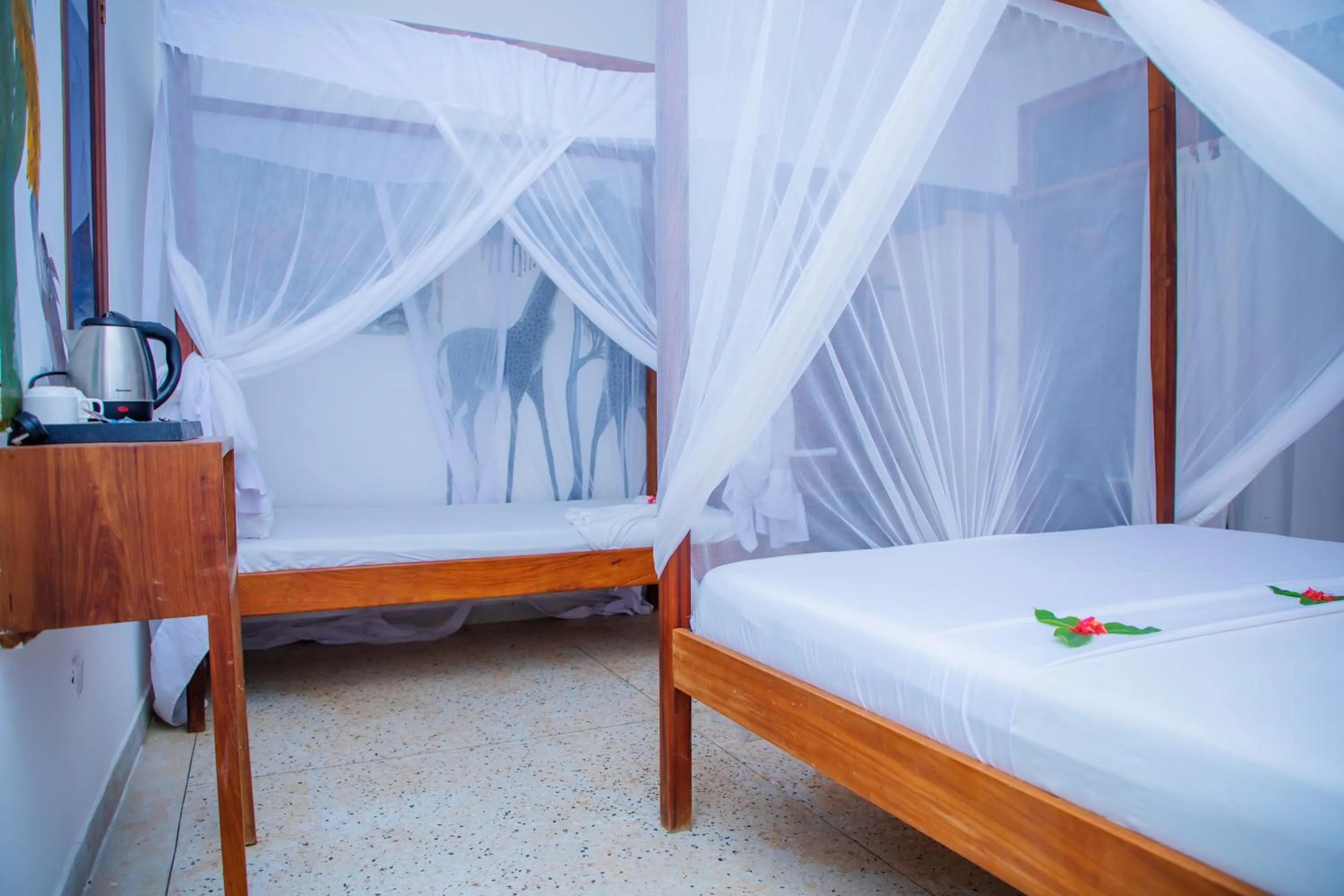 Bed in Art Hotel Zanzibar