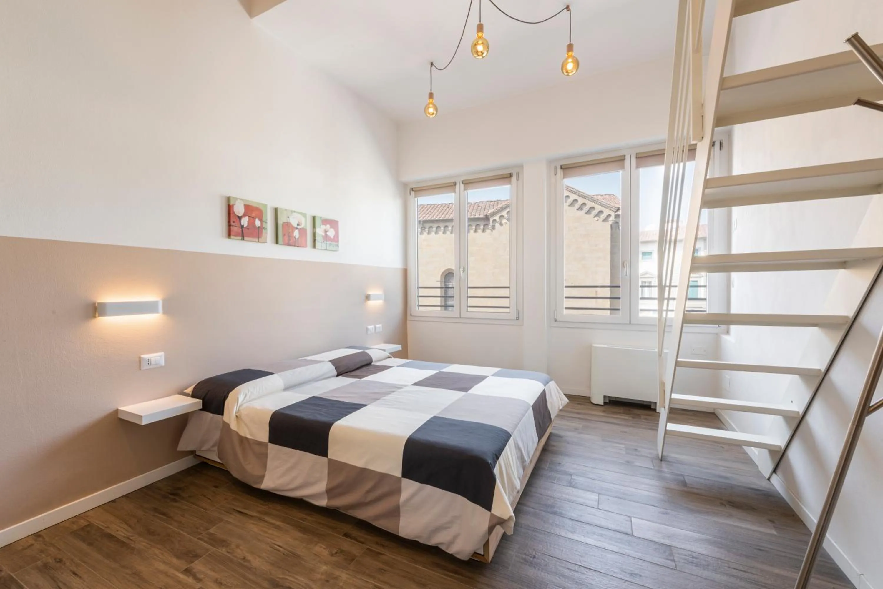 Bed in Ruote Stylish Loft by Mmega