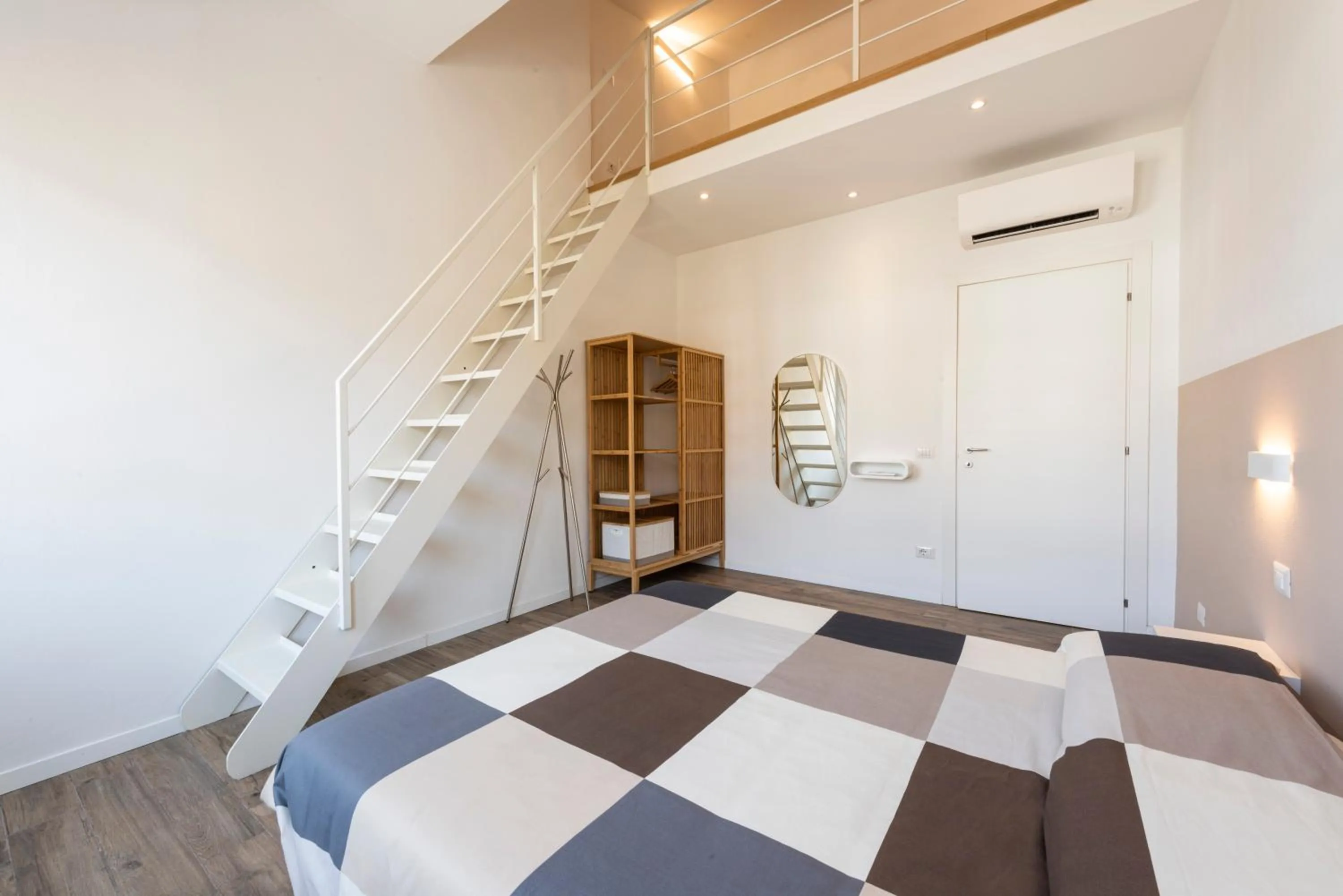 Bed in Ruote Stylish Loft by Mmega