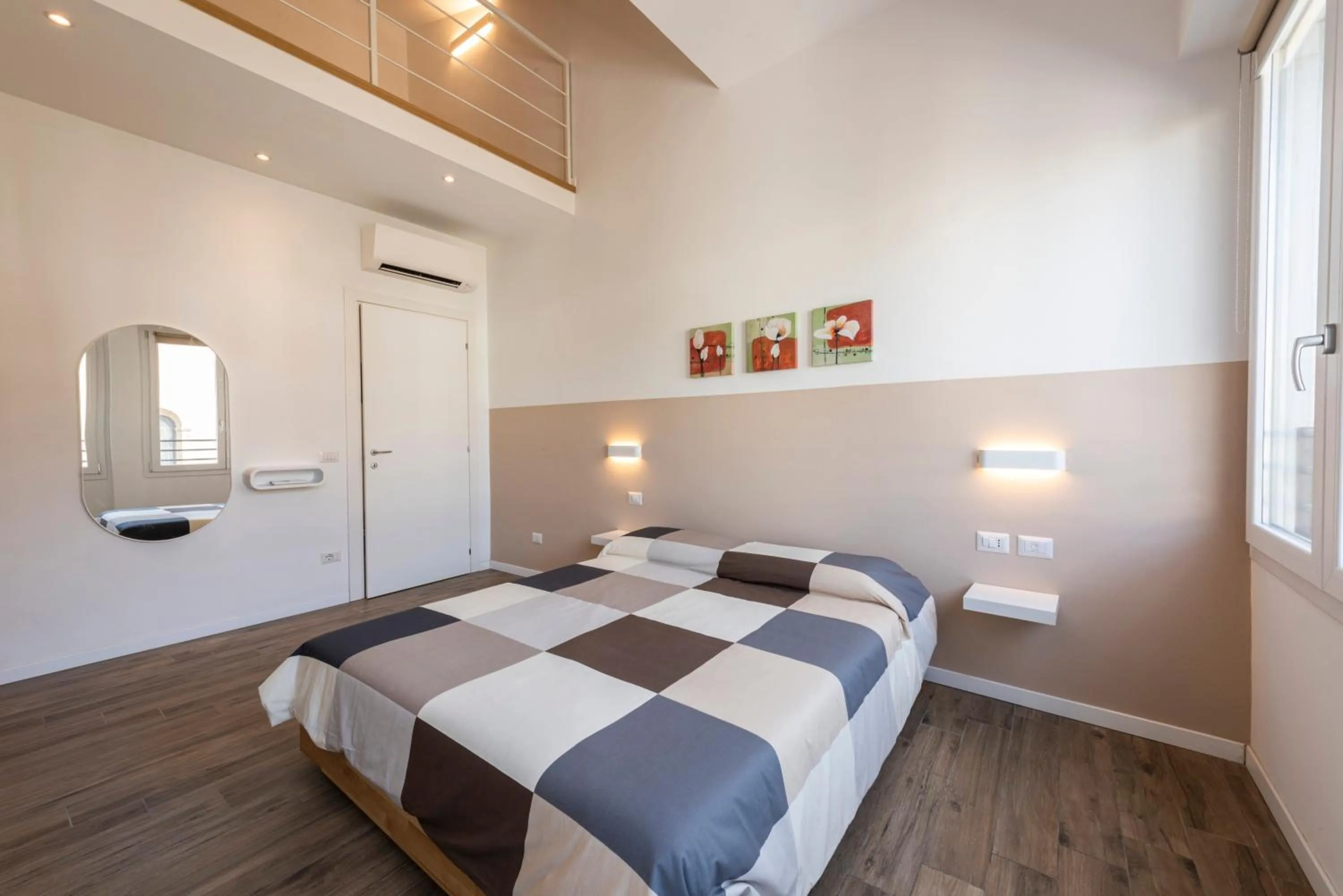 Bed in Ruote Stylish Loft by Mmega