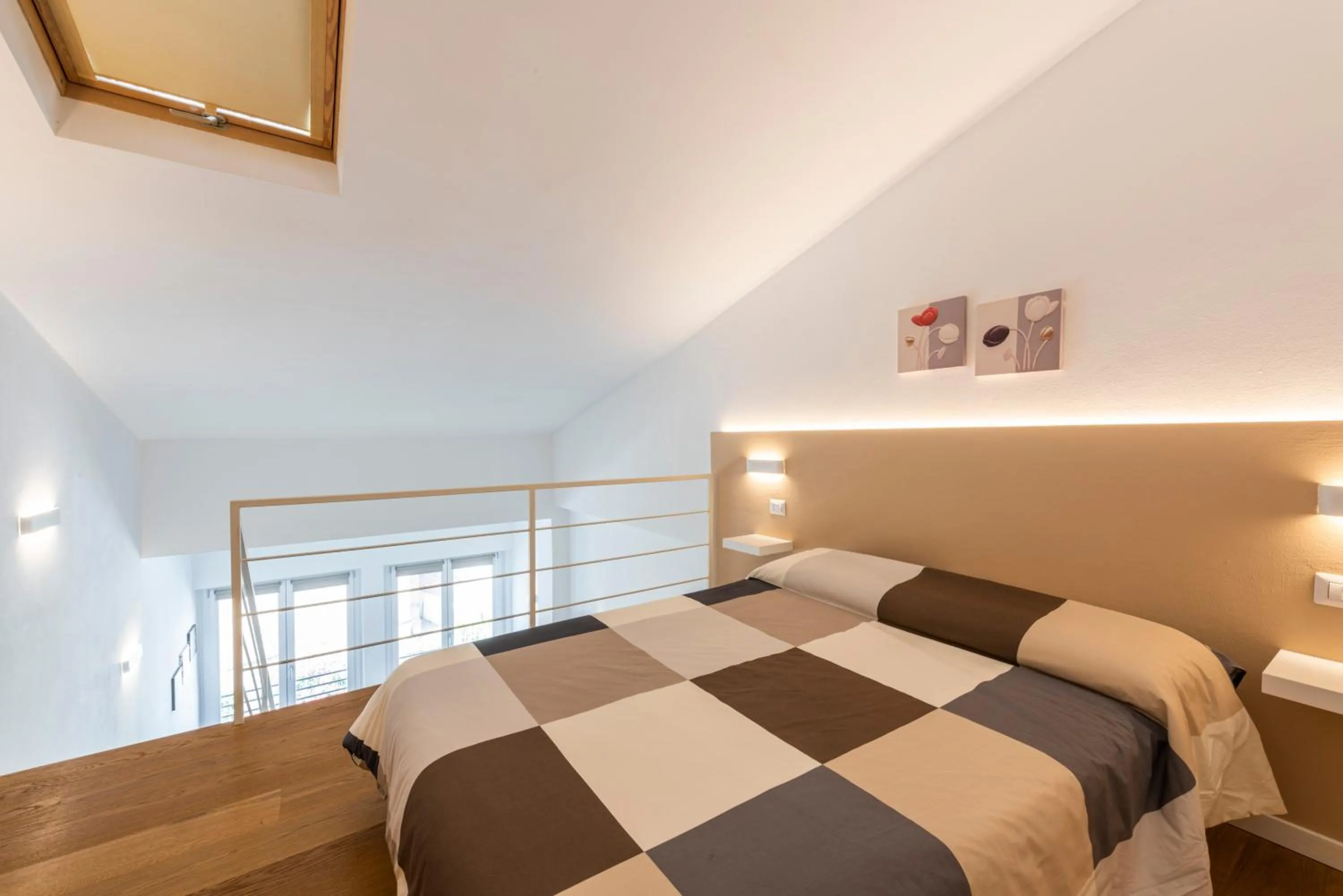 Bed in Ruote Stylish Loft by Mmega