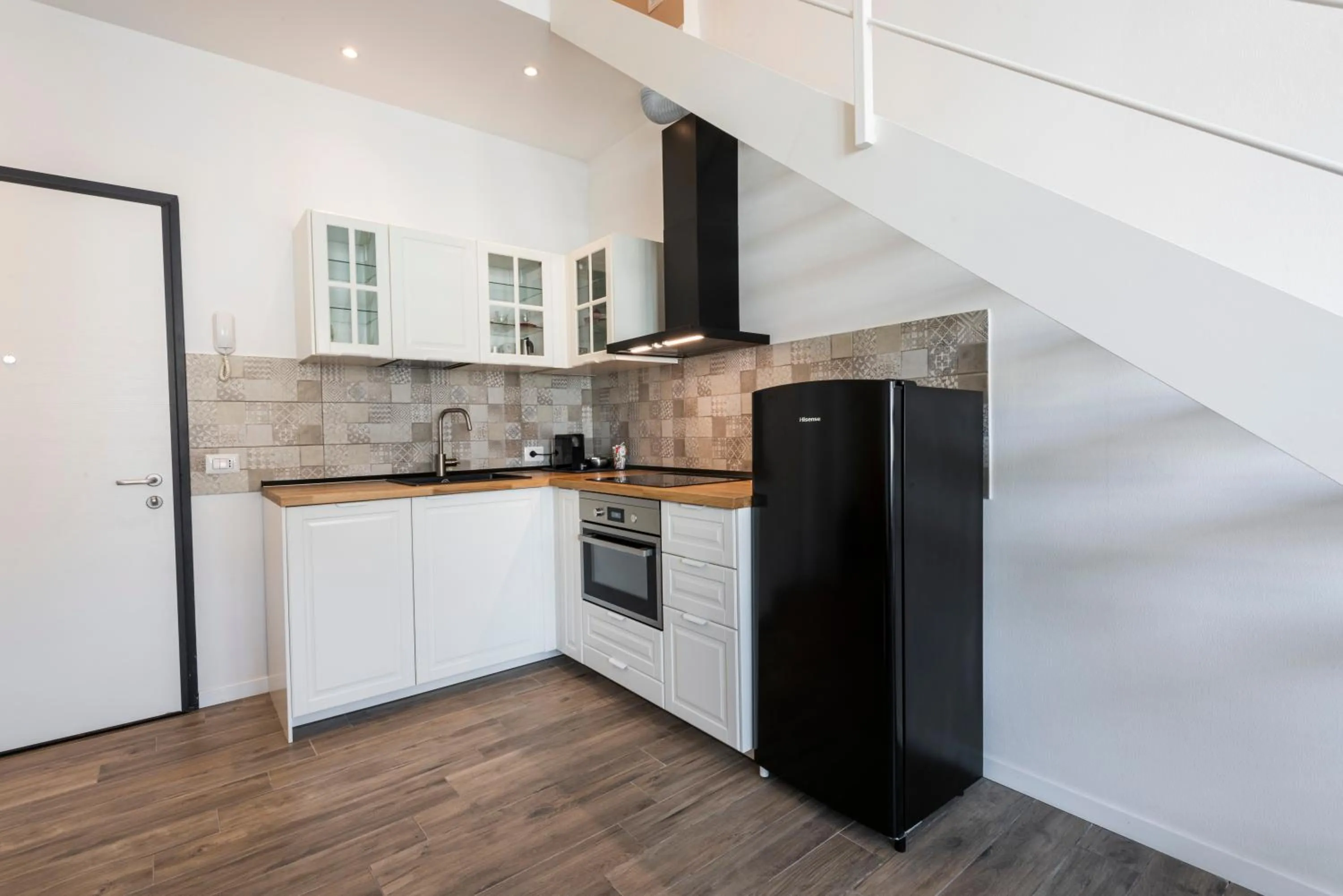 Kitchen or kitchenette in Ruote Stylish Loft by Mmega