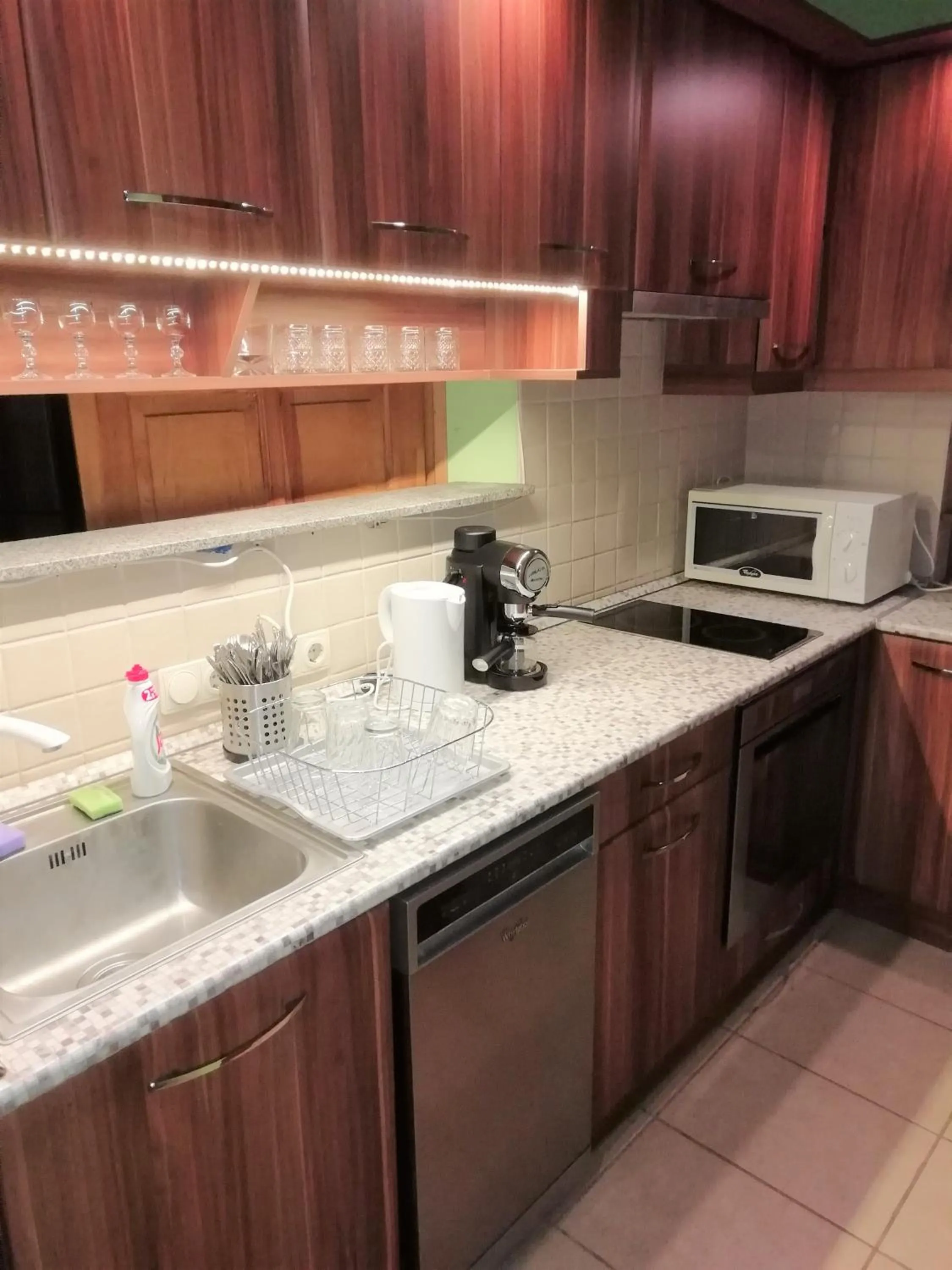 Kitchen or kitchenette in Aurora Apartments