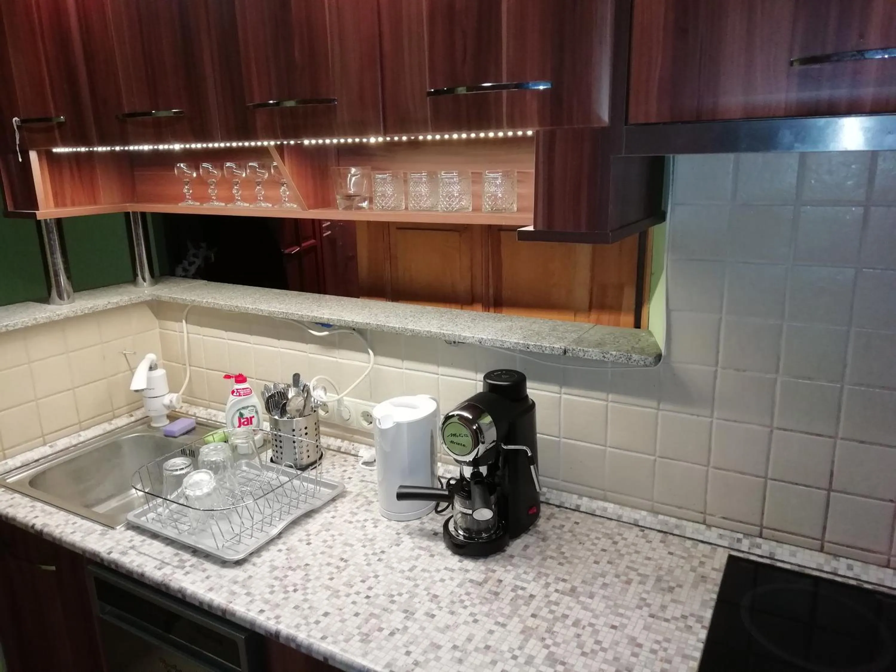Kitchen or kitchenette in Aurora Apartments