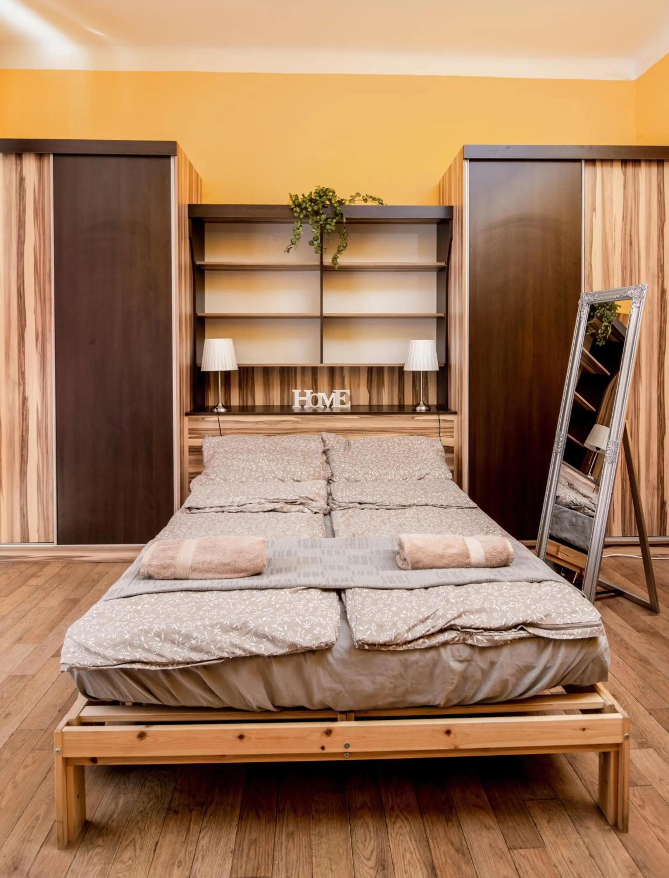Bed in Aurora Apartments