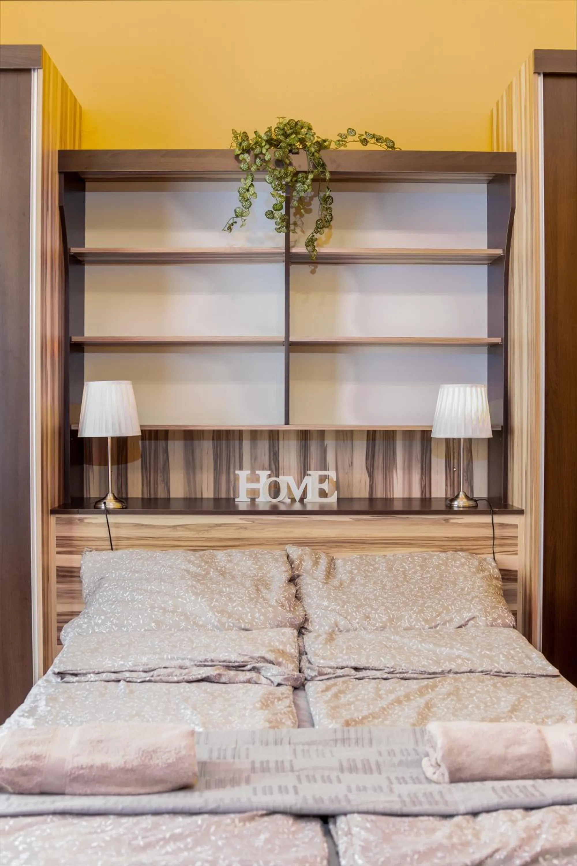 Bed in Aurora Apartments