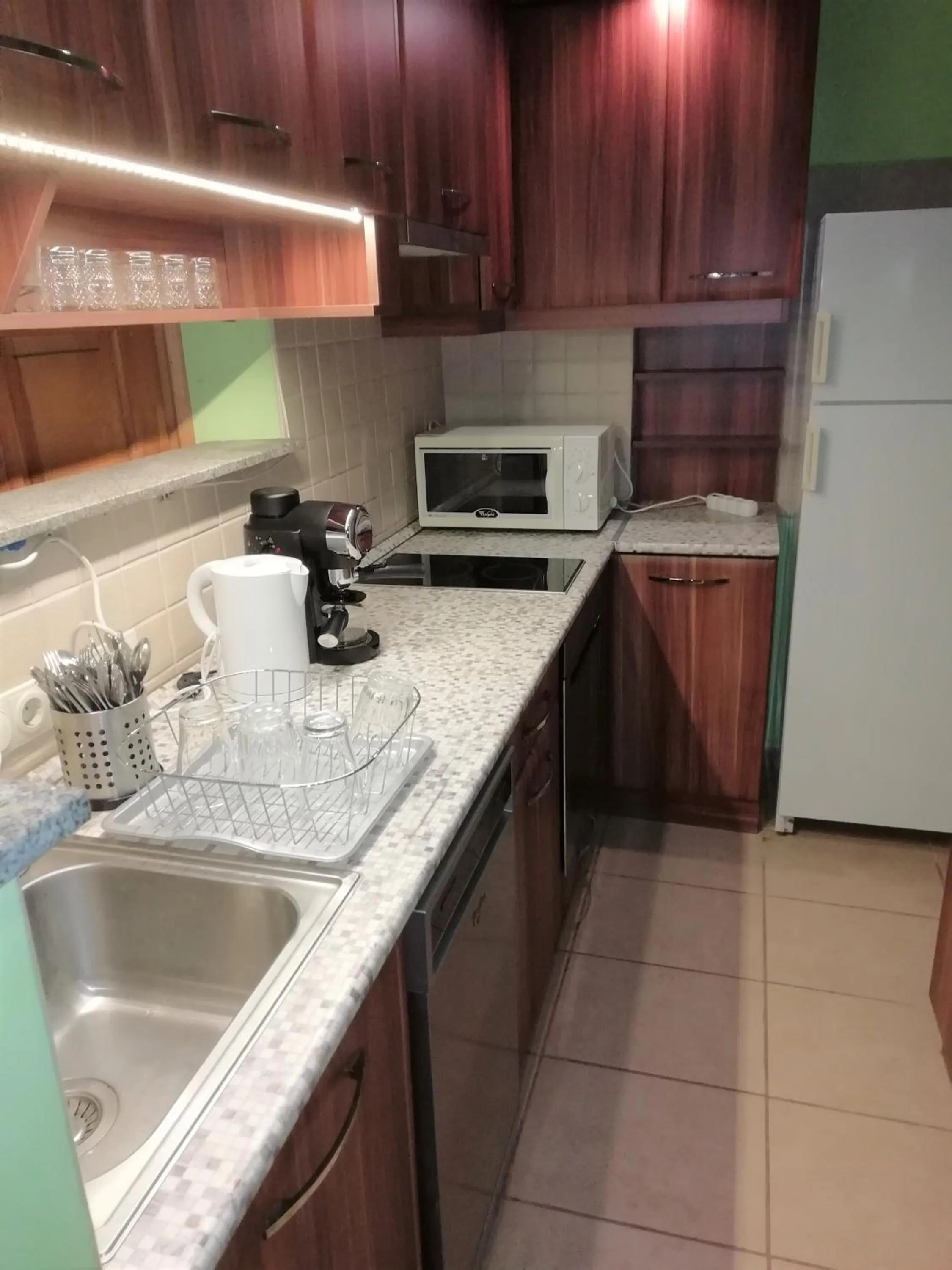 Kitchen or kitchenette in Aurora Apartments