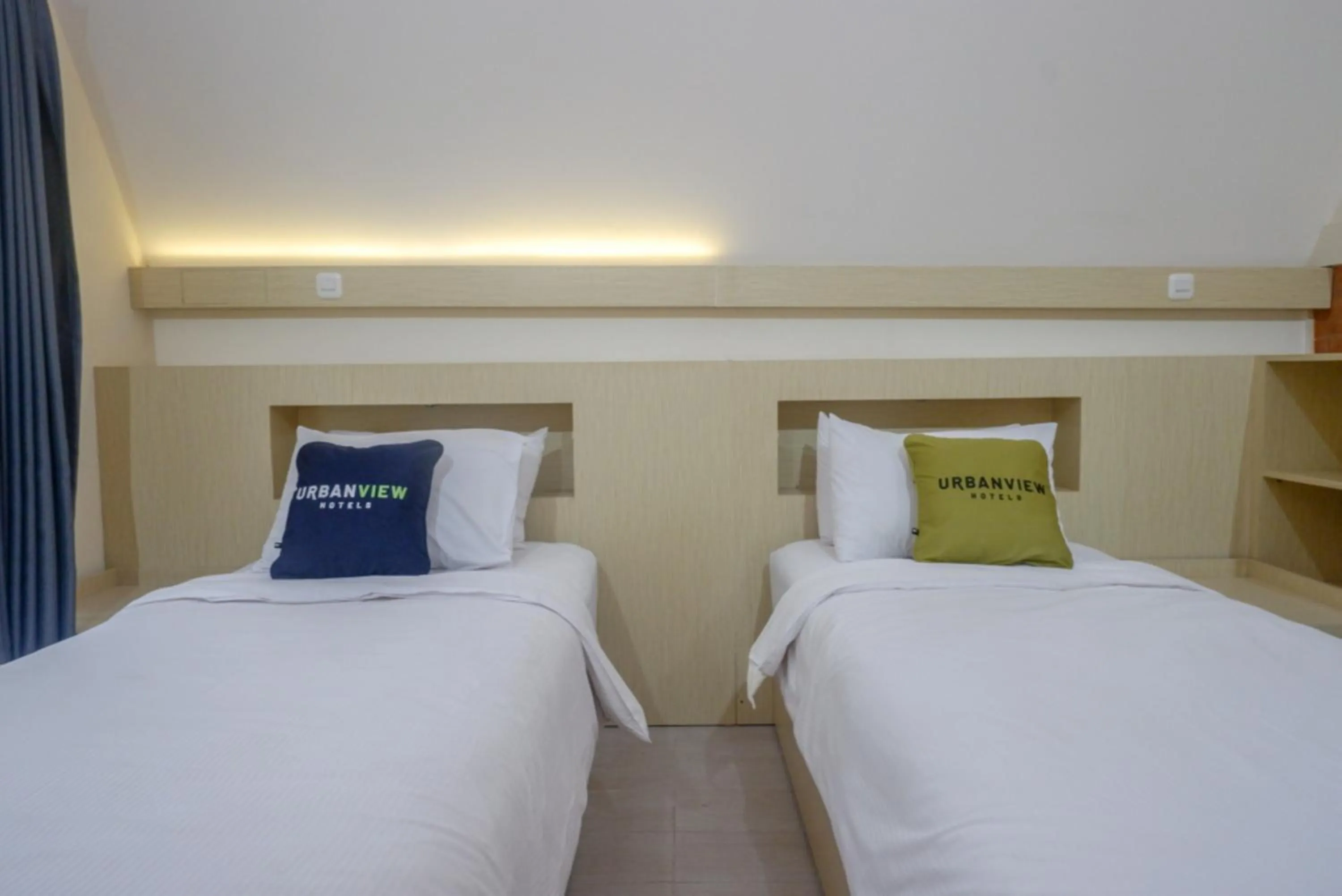 Bed in Urbanview Resort Kampoeng Media Yogyakarta by RedDoorz