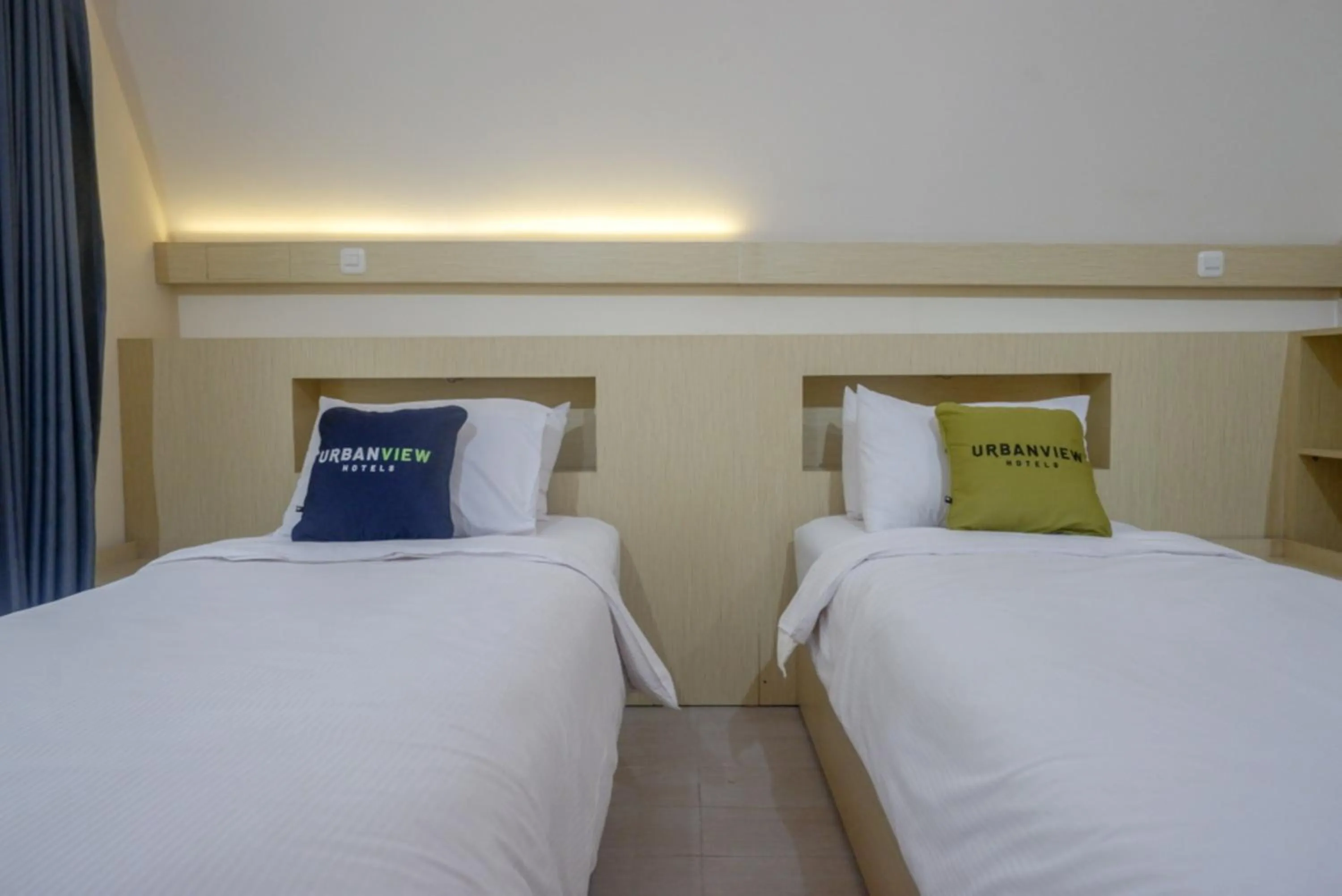 Bed in Urbanview Resort Kampoeng Media Yogyakarta by RedDoorz