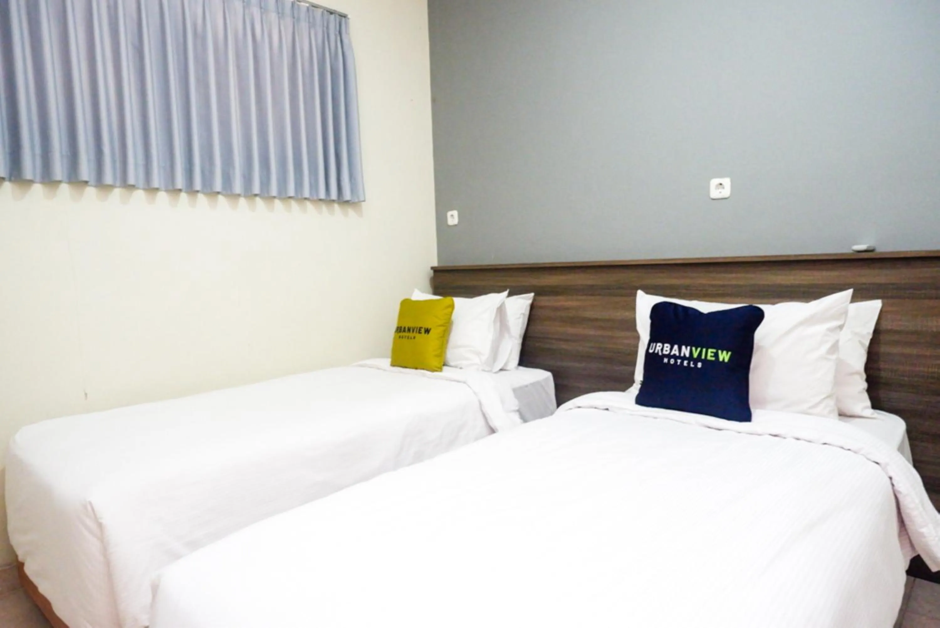 Bed in Urbanview Resort Kampoeng Media Yogyakarta by RedDoorz