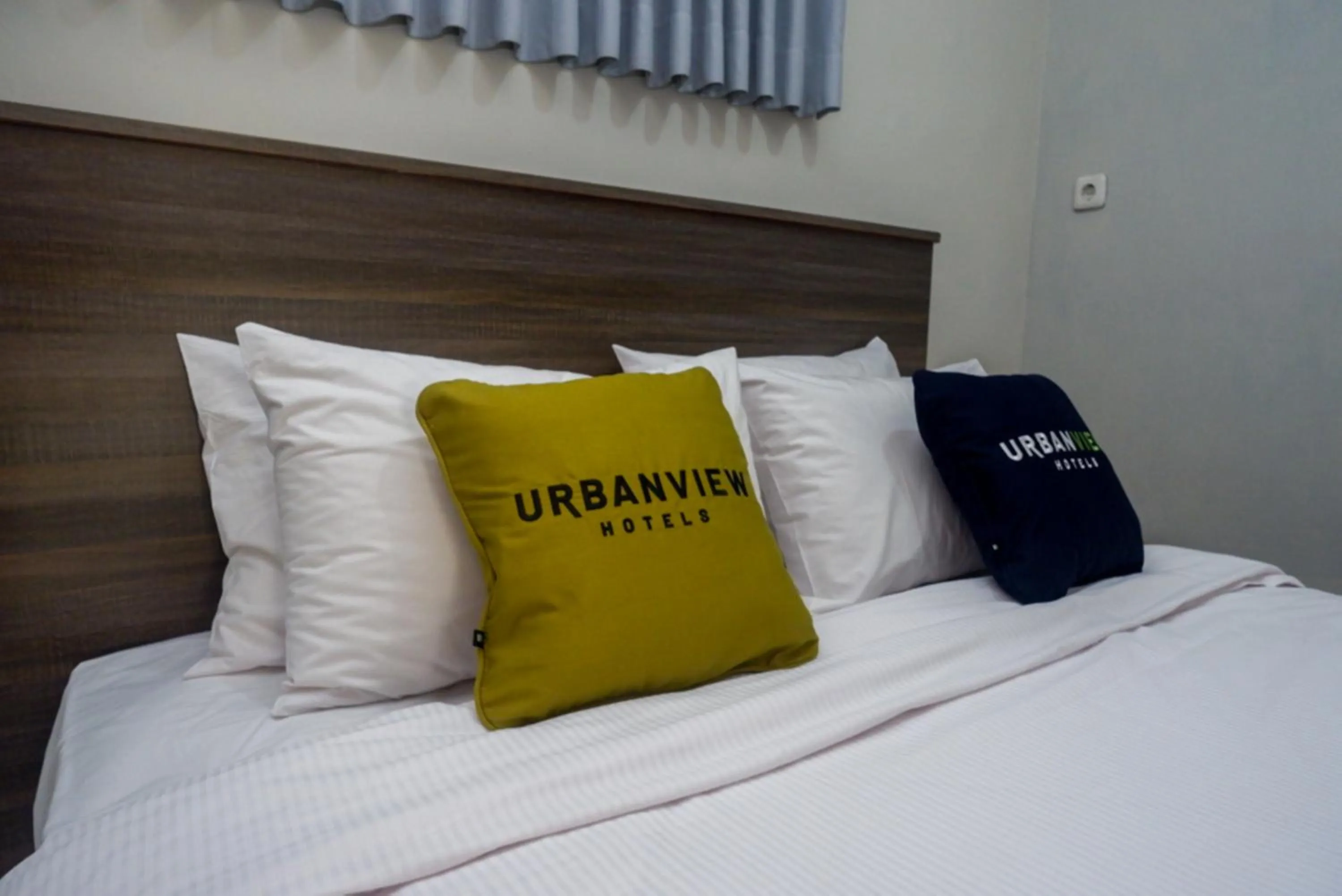 Bed in Urbanview Resort Kampoeng Media Yogyakarta by RedDoorz