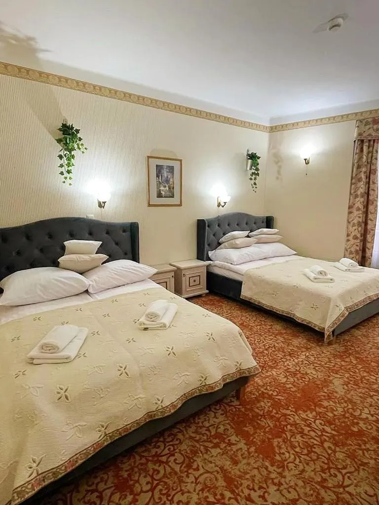 Photo of the whole room in Great Polonia Kraków Old Town