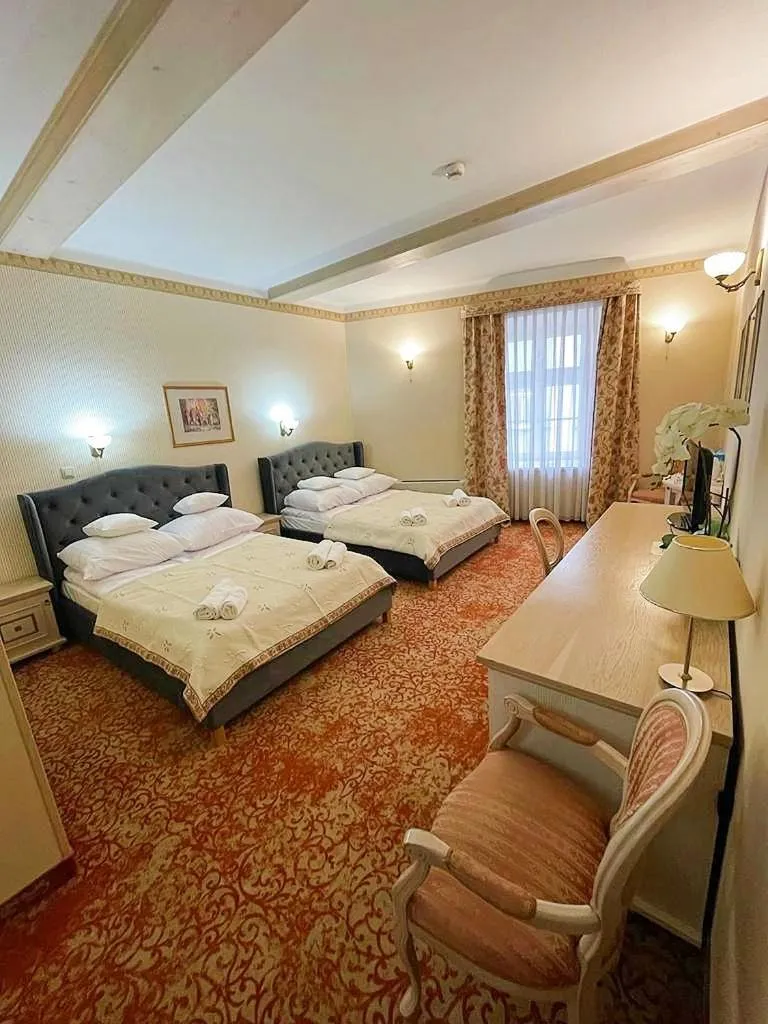 Photo of the whole room in Great Polonia Kraków Old Town
