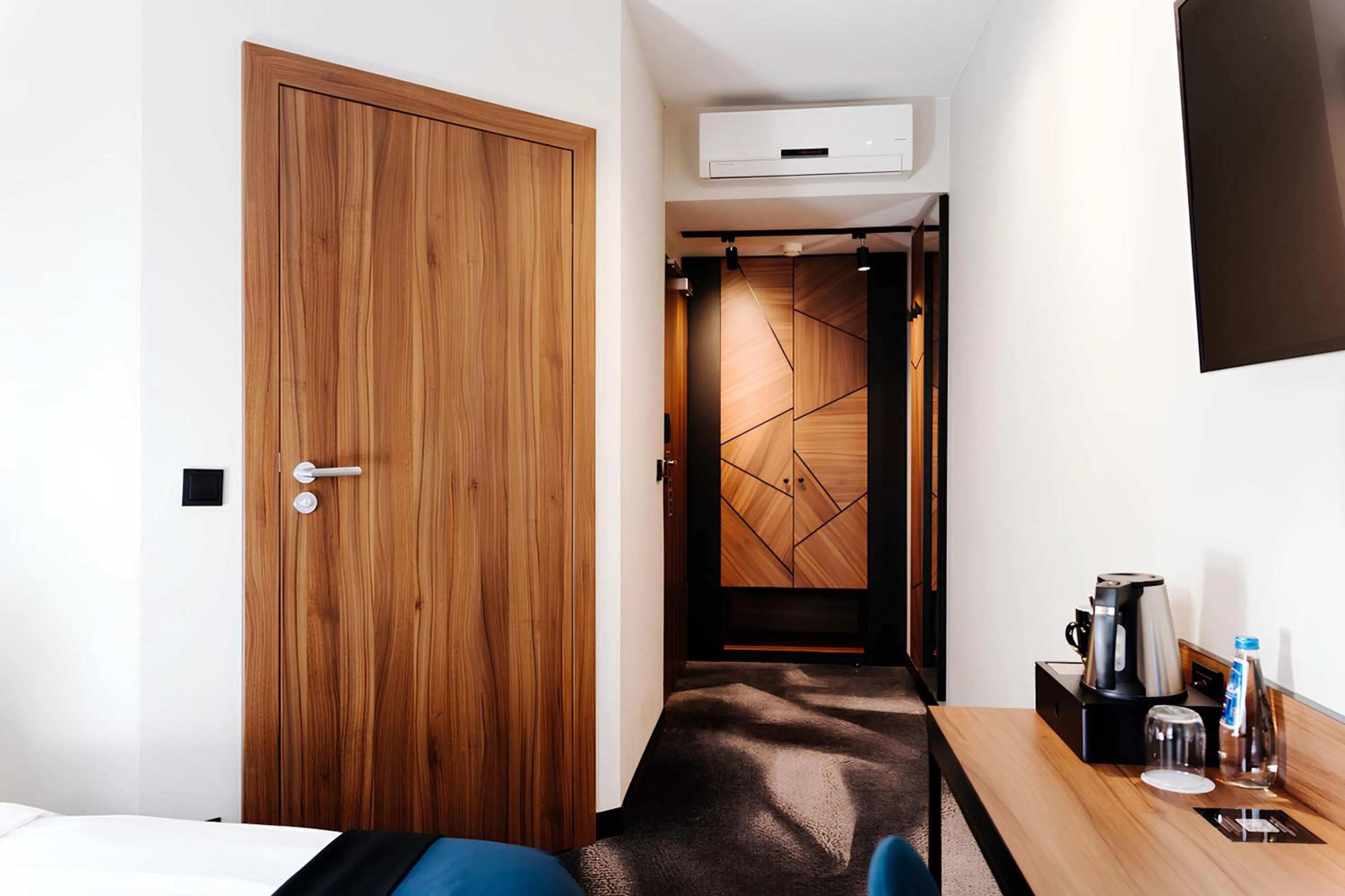 Bed in Ascot Premium Hotel