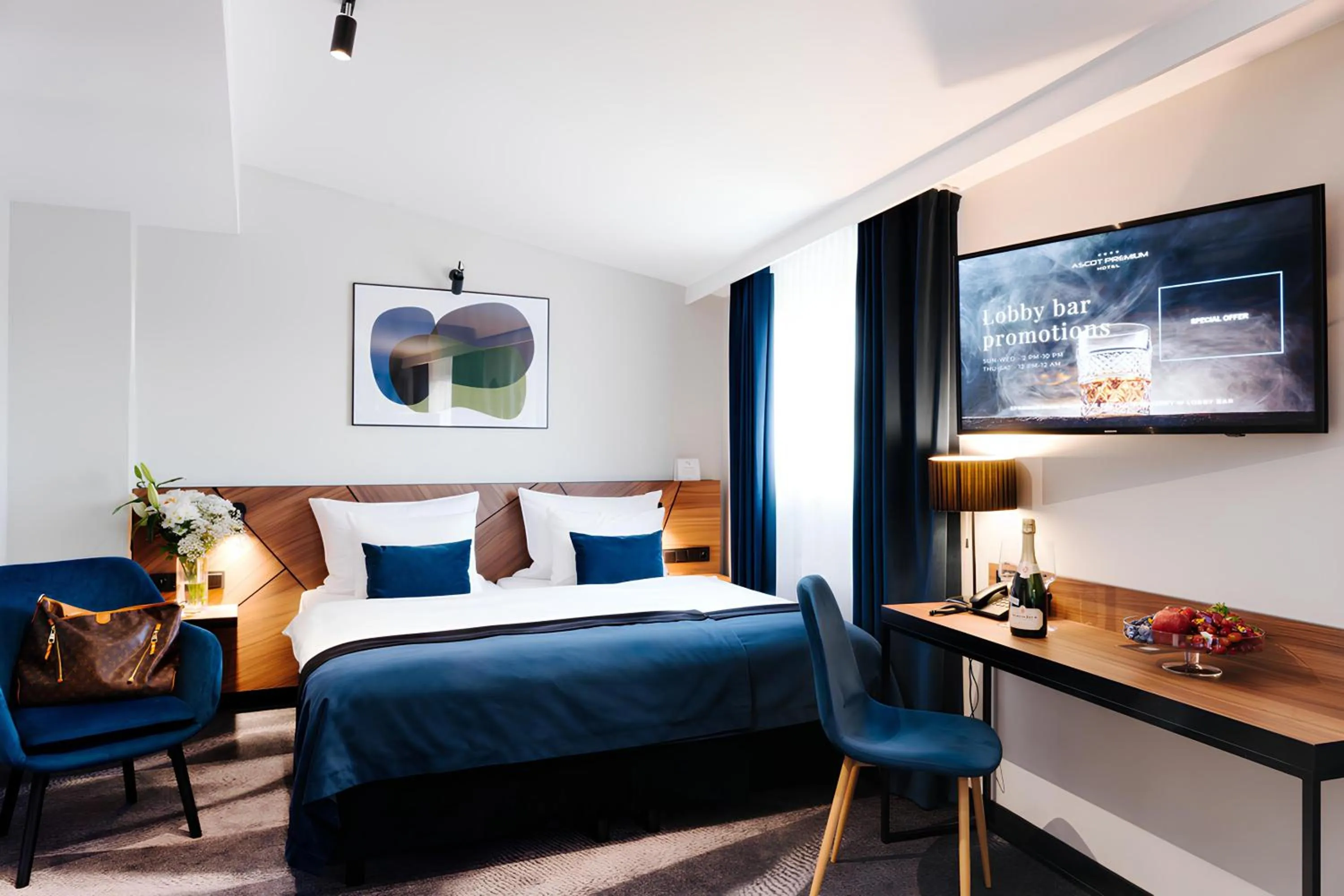 Bed in Ascot Premium Hotel