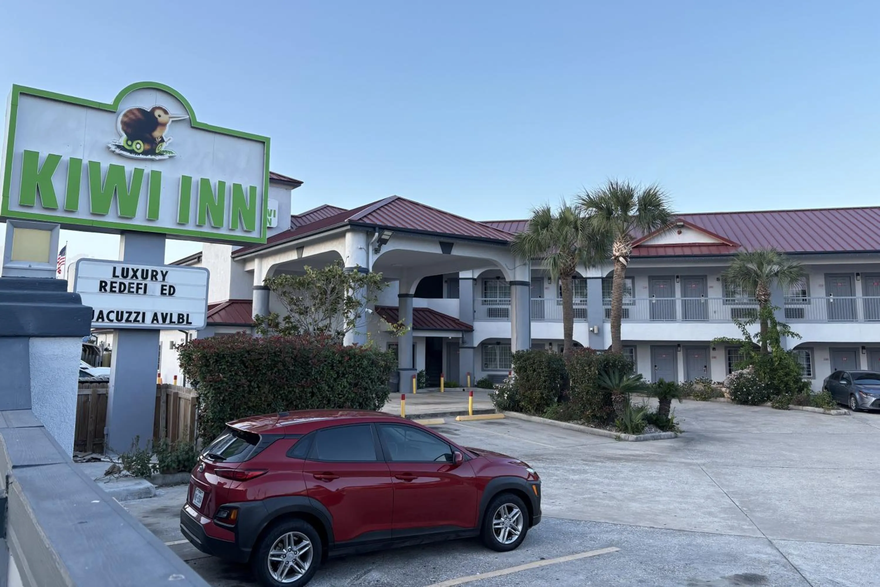 Property building in Kiwi Inn Capital O Houston - Hwy 249