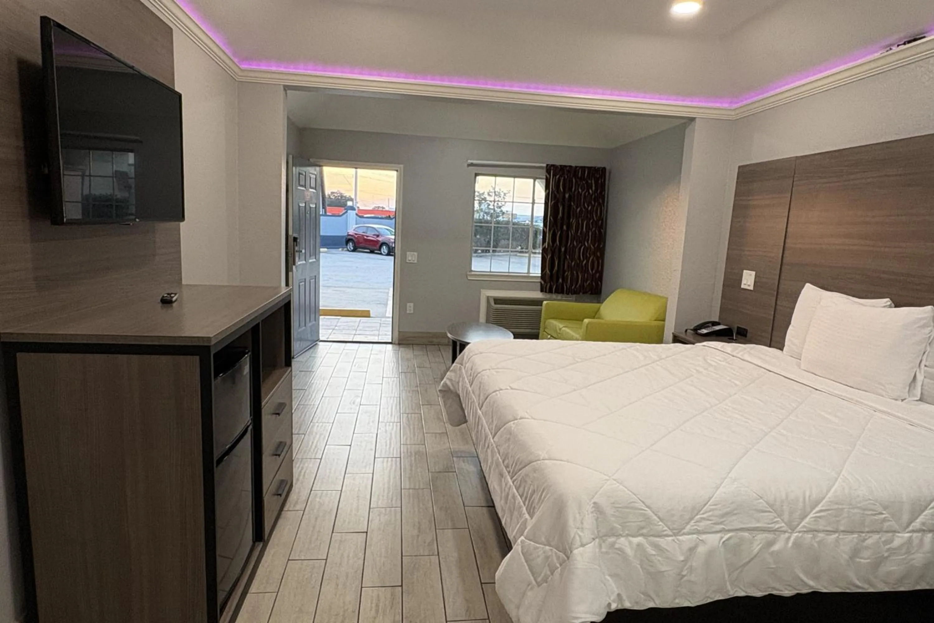 Bedroom, Bed in Kiwi Inn Capital O Houston - Hwy 249