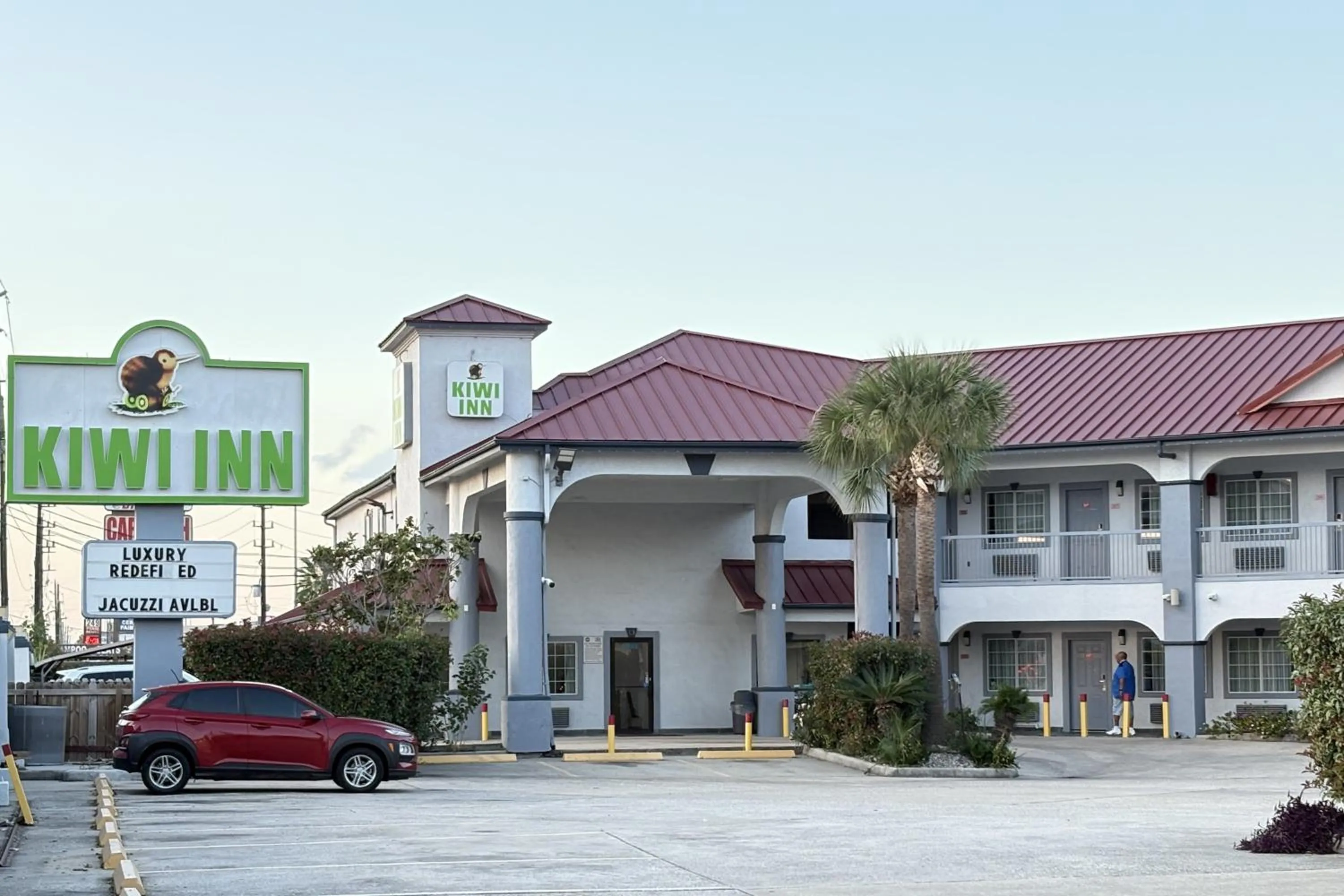 Property building in Kiwi Inn Capital O Houston - Hwy 249