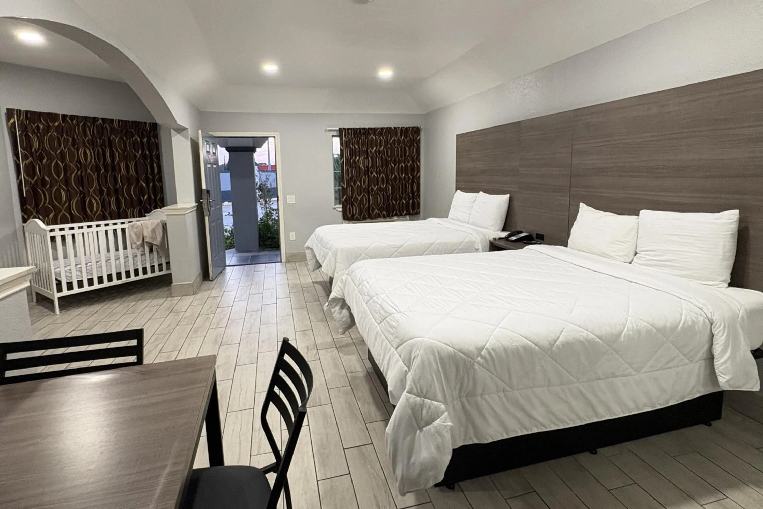 Bedroom, Bed in Kiwi Inn Capital O Houston - Hwy 249