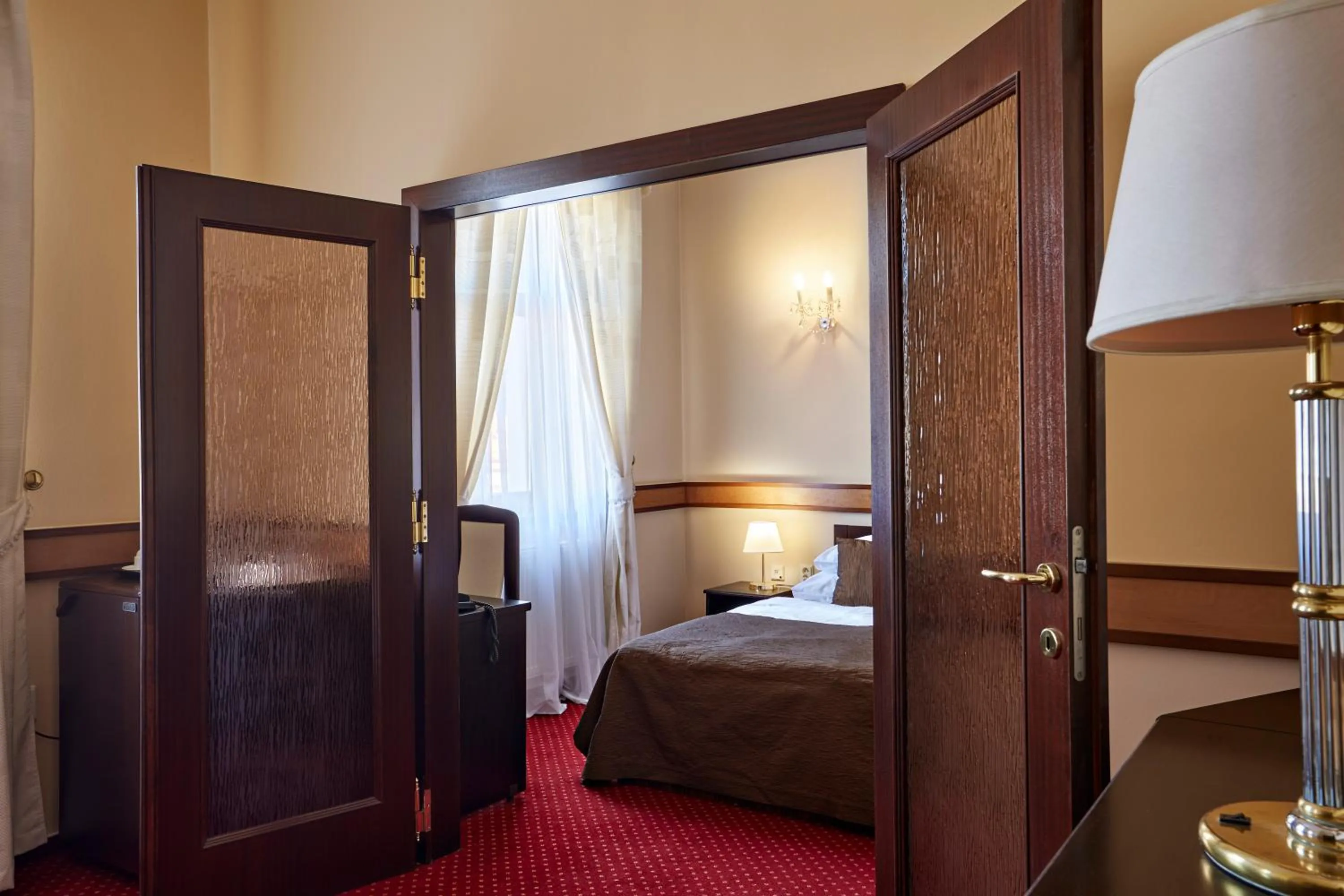 Bed in FLEUR DE LIS HOTEL