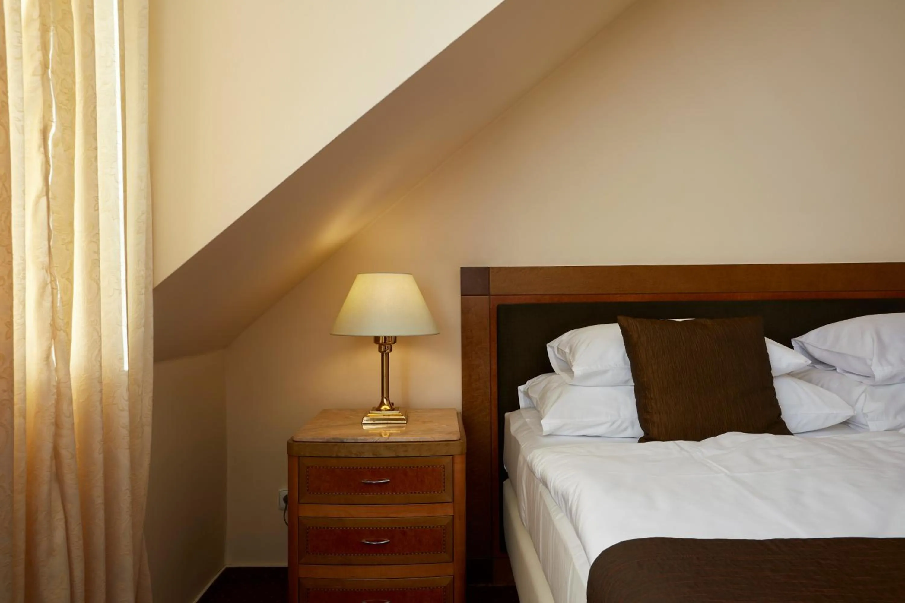 Bed in FLEUR DE LIS HOTEL