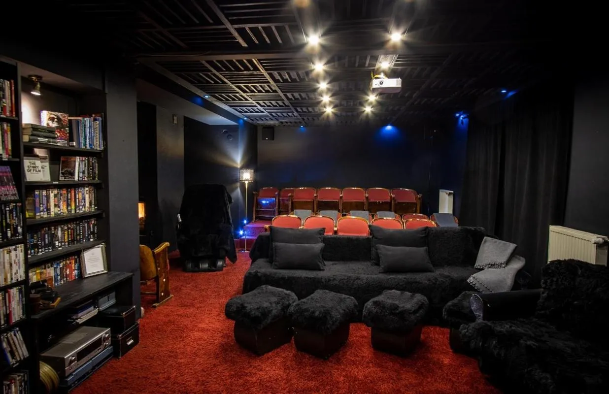 Communal lounge/ TV room in Villa Toscana Boutique