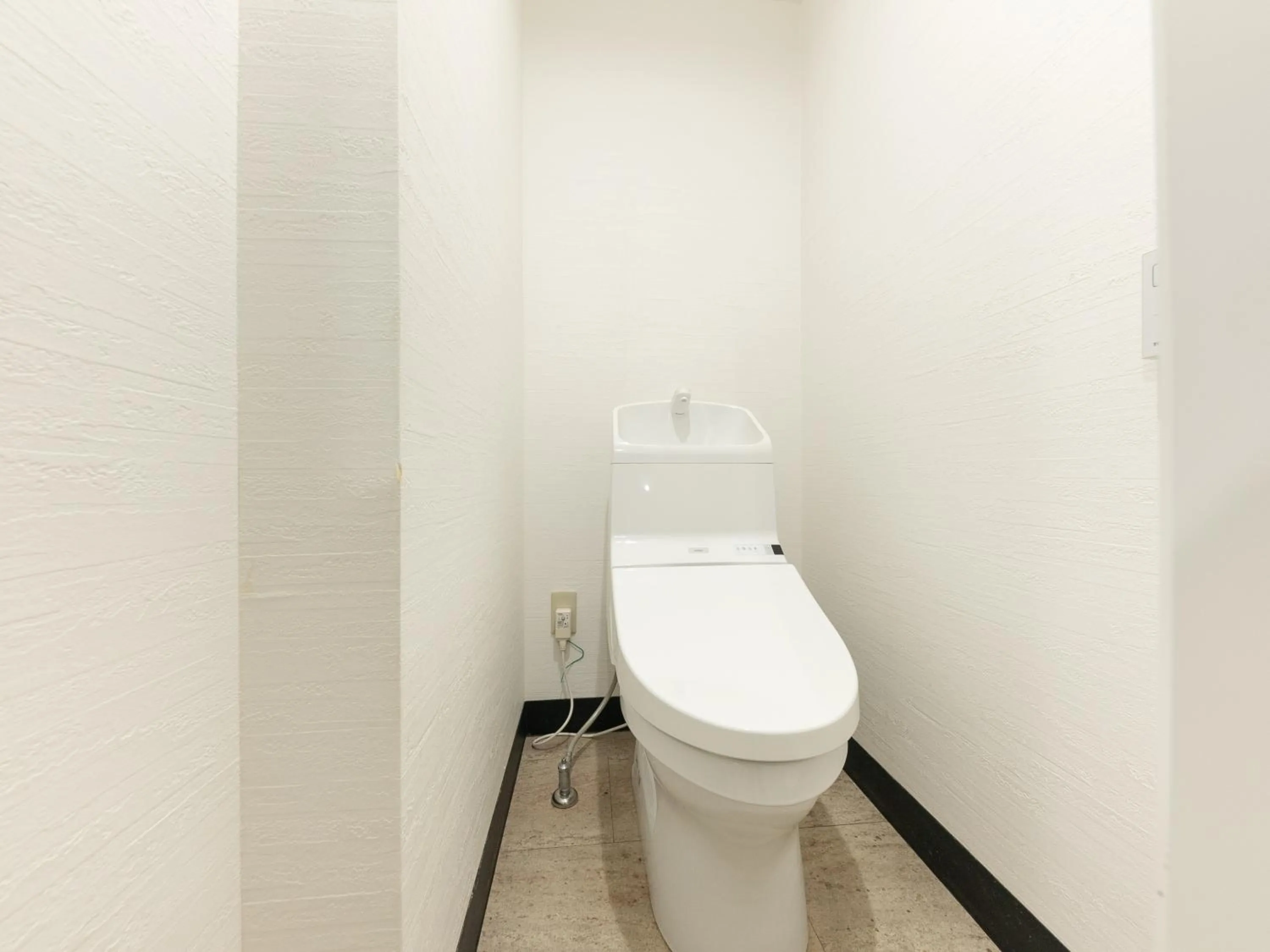 Toilet in Hiromas Hostel in Ueno