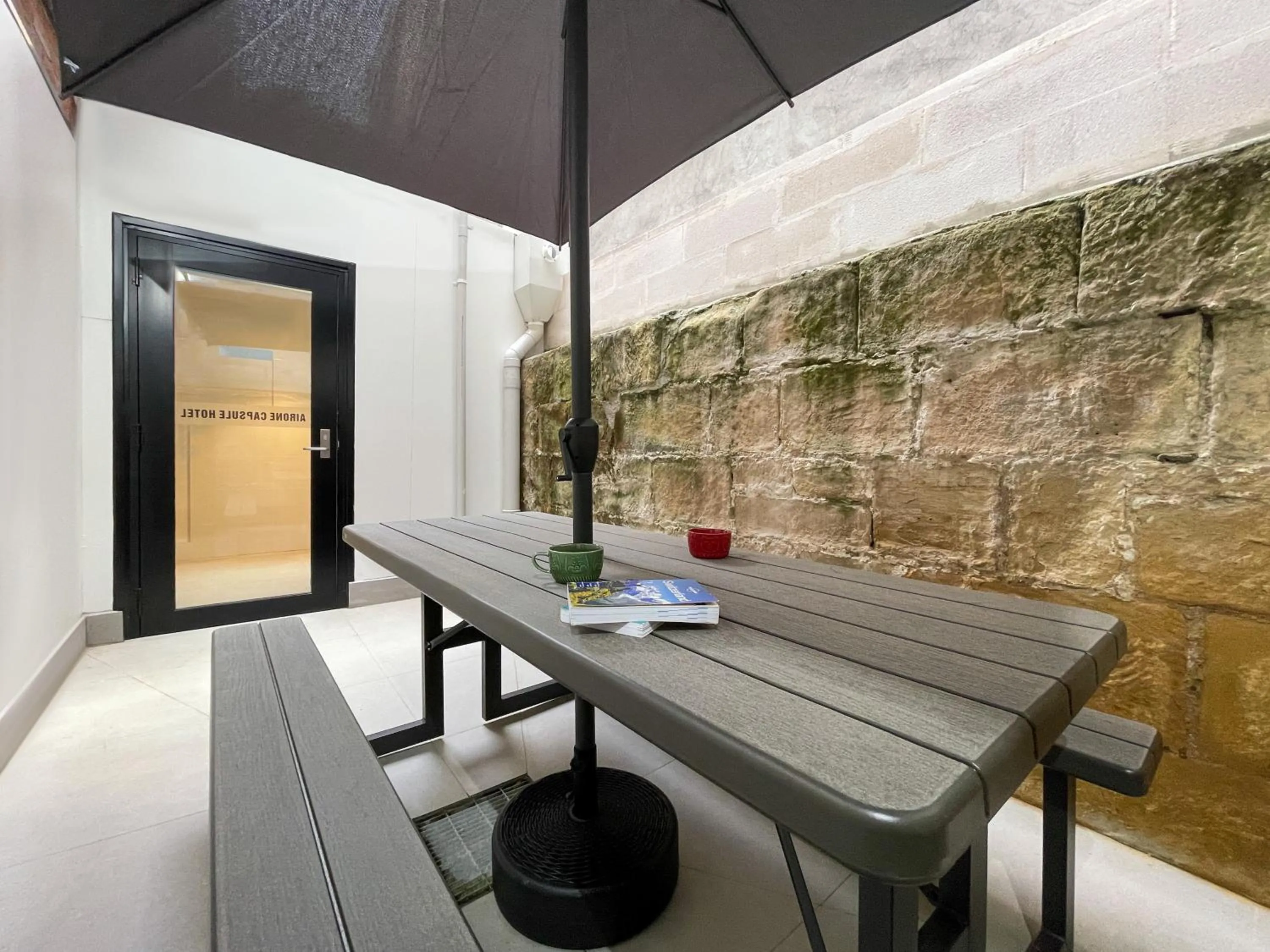 Dining area in Airone Capsule Hotel