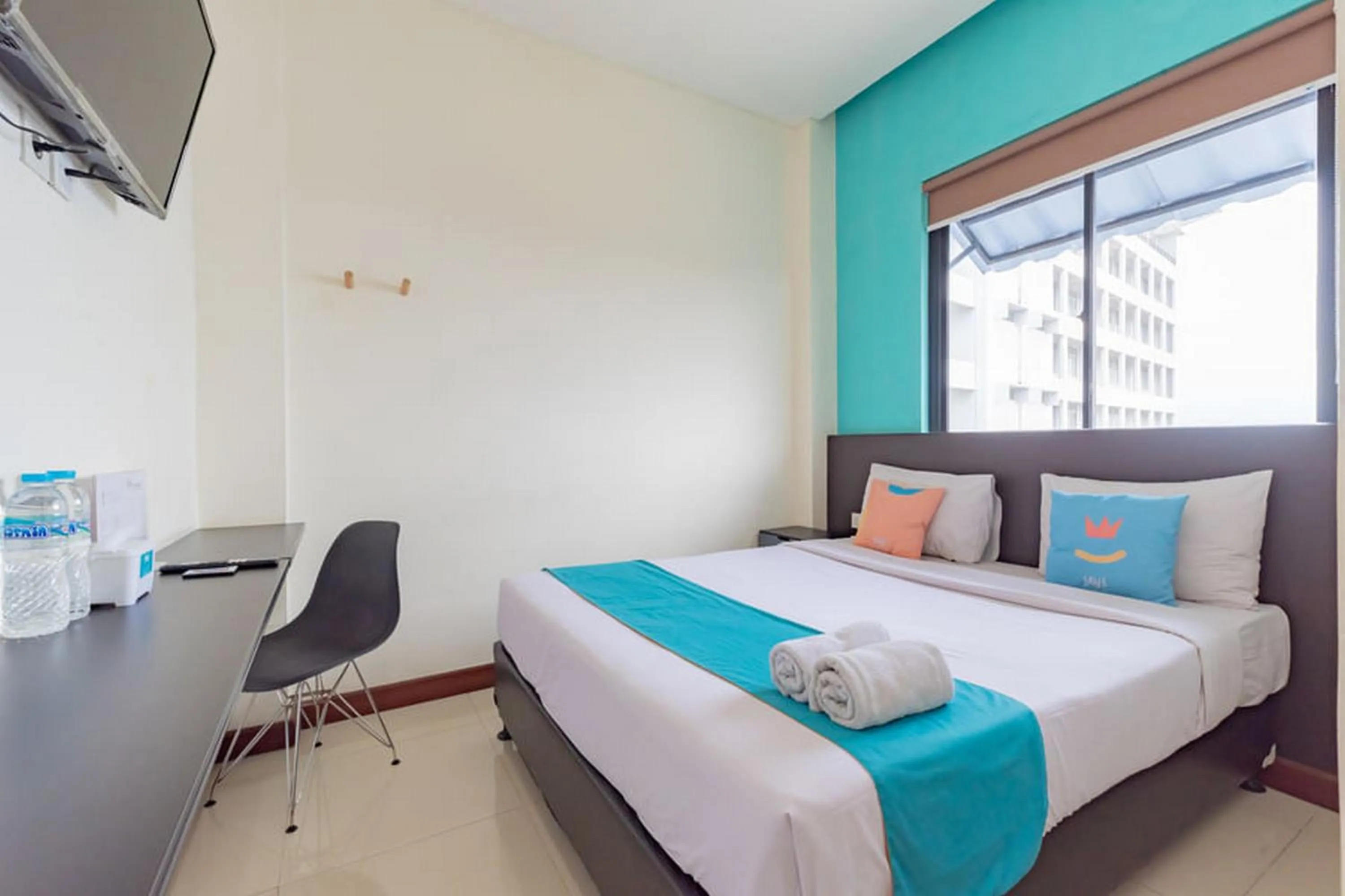 Bedroom, Bed in Sans Hotel Suryakencana Bogor