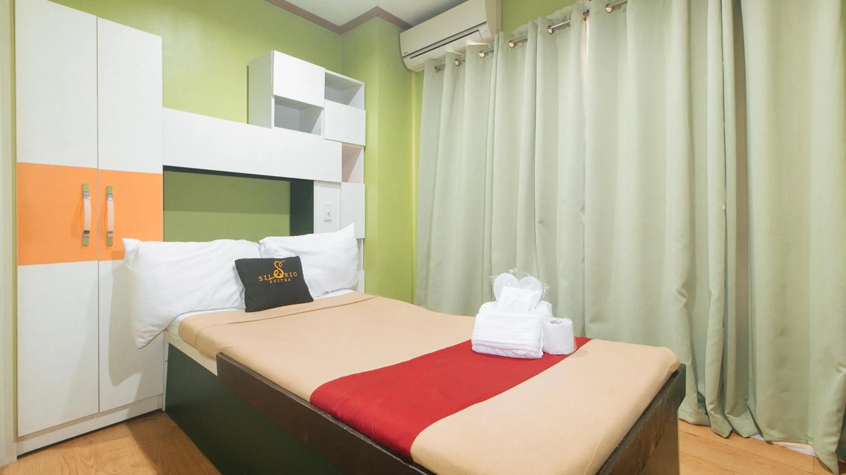 Bedroom, Bed in 153 Silverio Suites Paranaque City