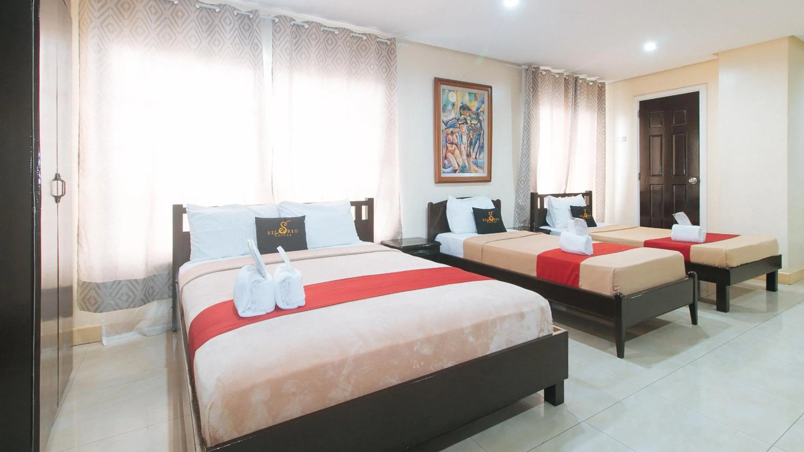 Photo of the whole room, Bed in 153 Silverio Suites Paranaque City