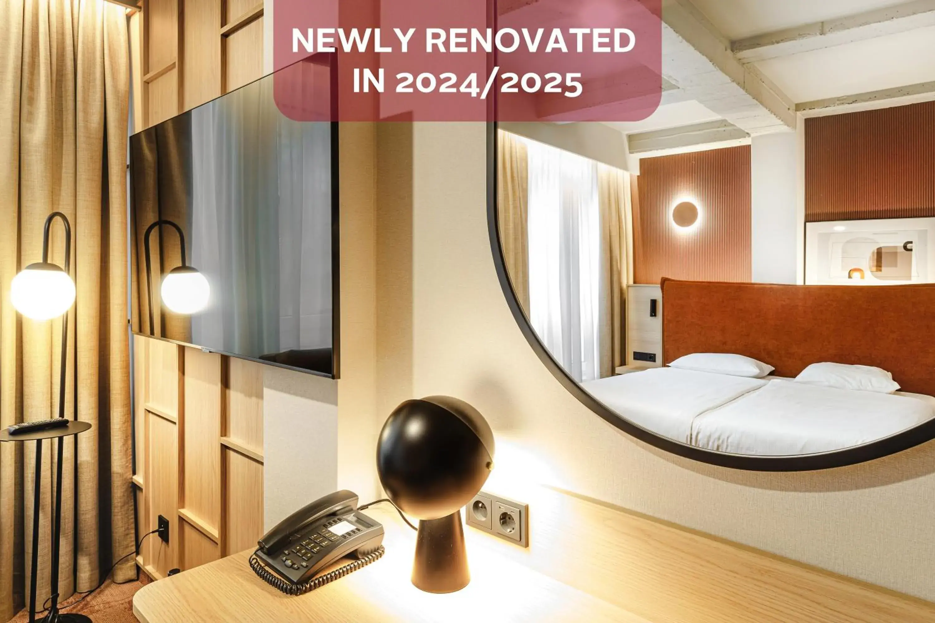 TV and multimedia, Bed in Qubus Hotel Wrocław TV and multimedia, Bed in Qubus Hotel Wrocław