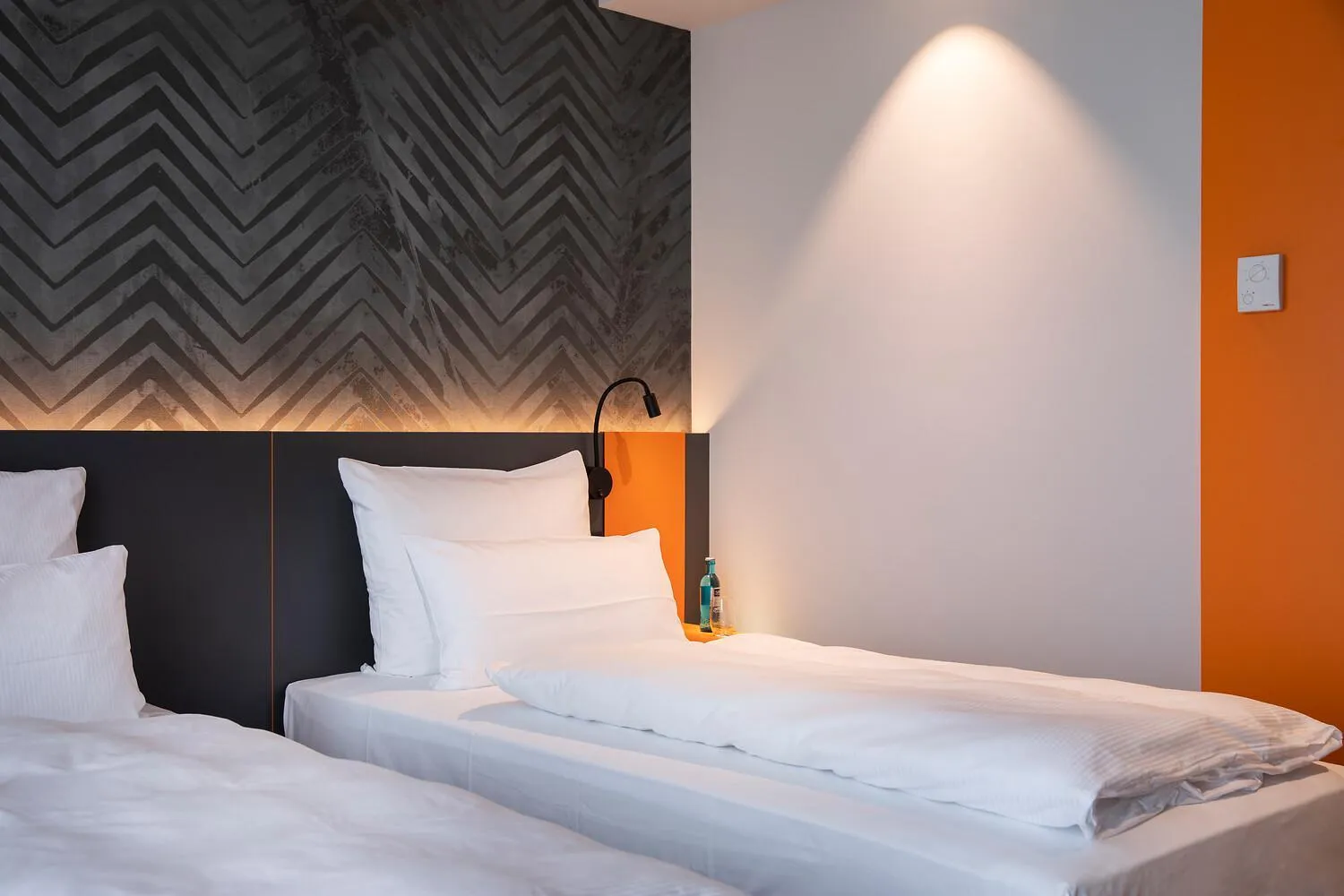 Bed in LOGINN Hotel Berlin Airport