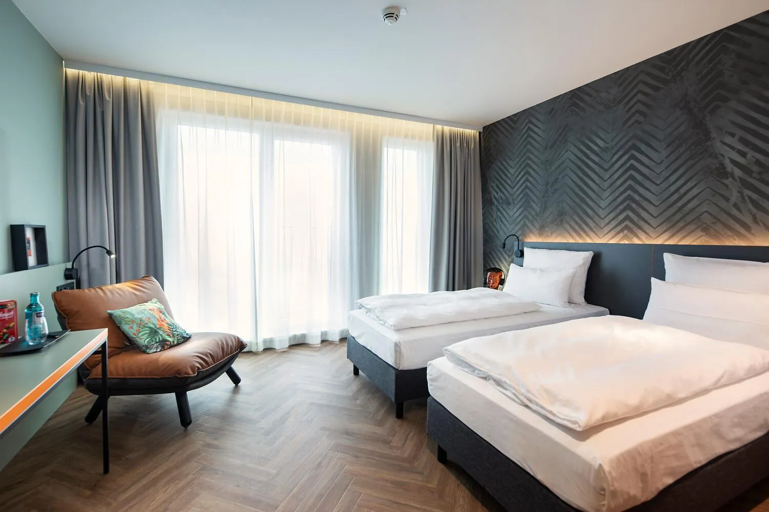Photo of the whole room, Bed in LOGINN Hotel Berlin Airport