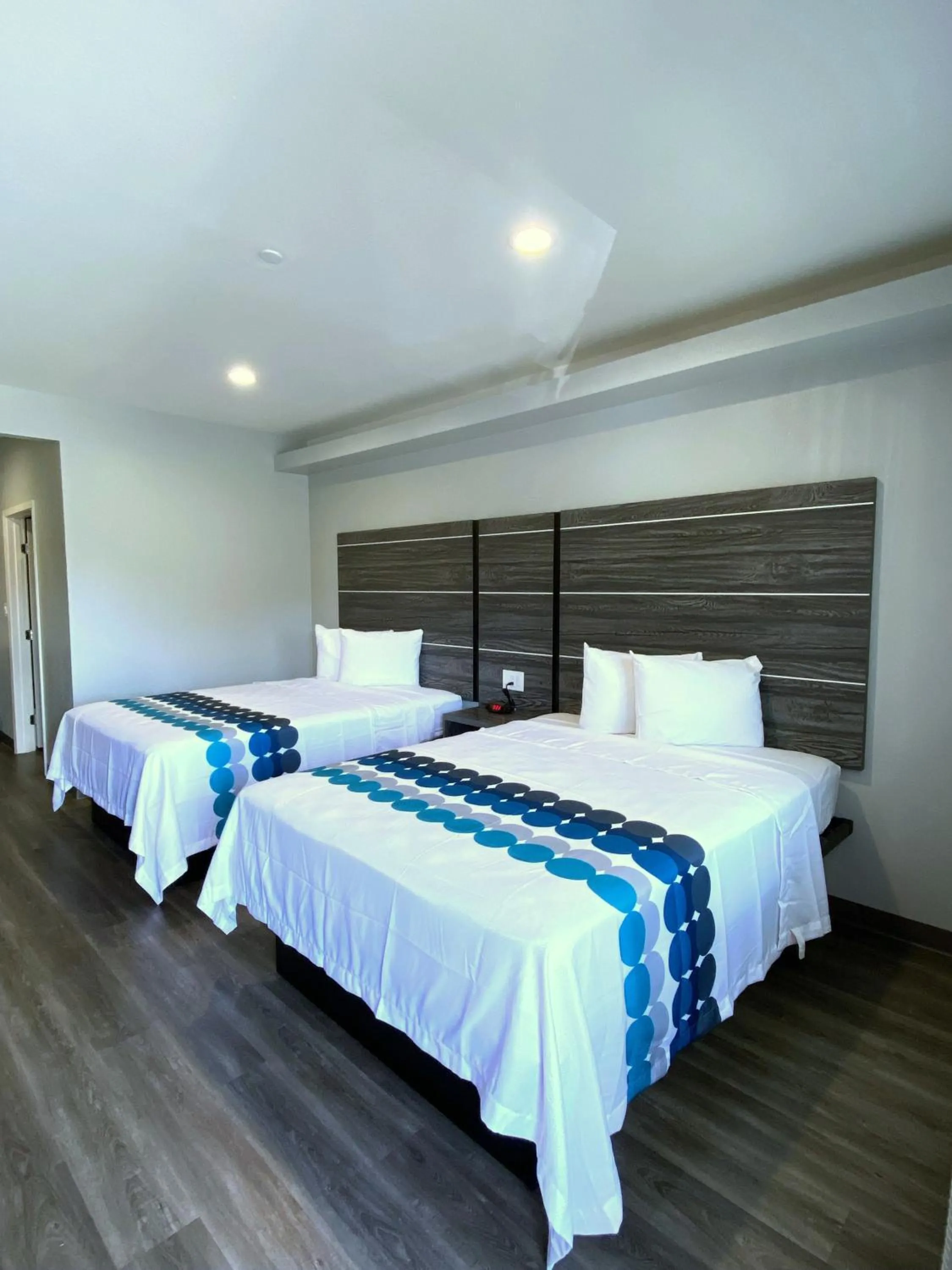 Bed in PALACEINN-ARCOLA