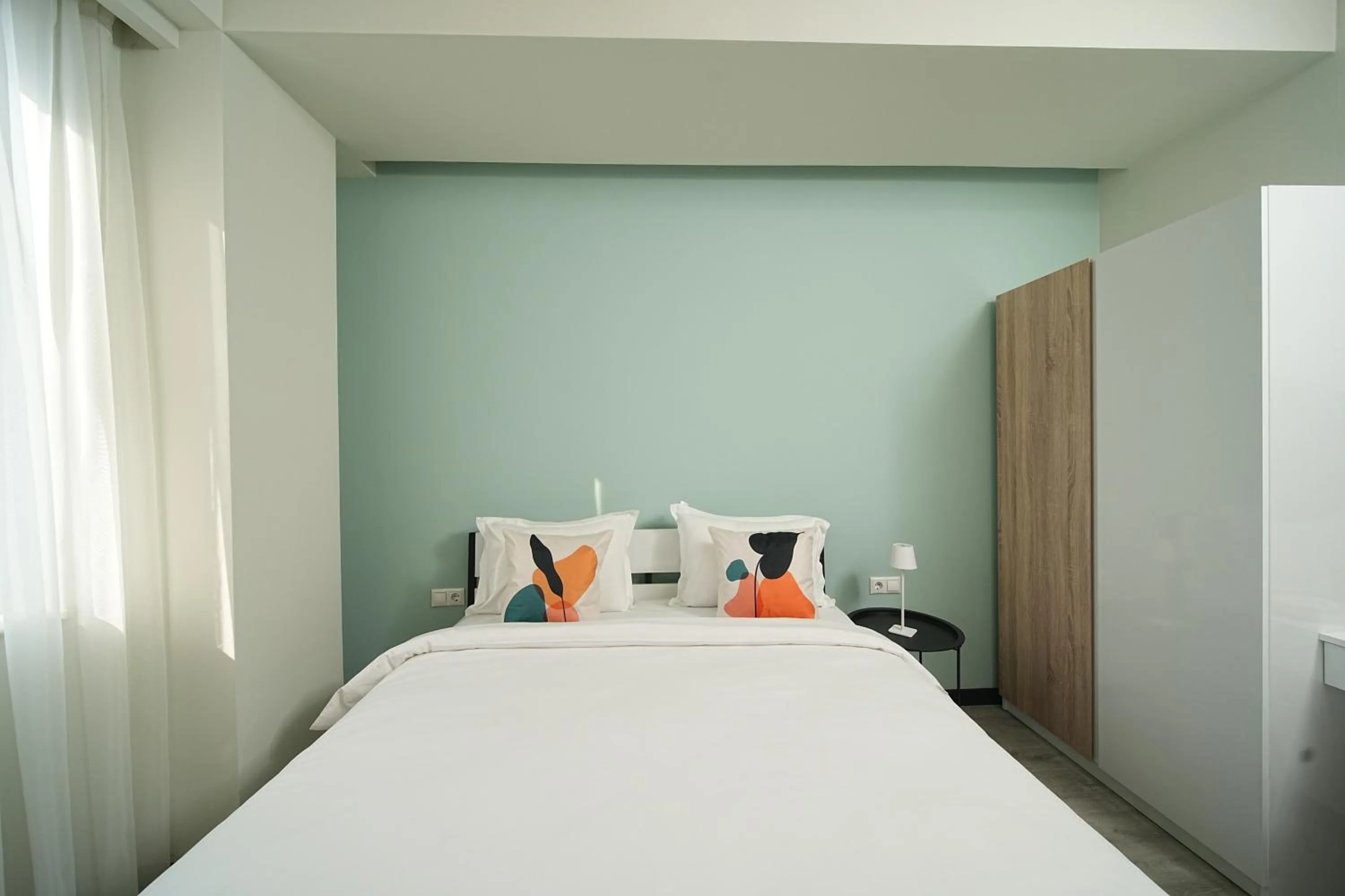 Bed in Sweet Home Apart-Hotel